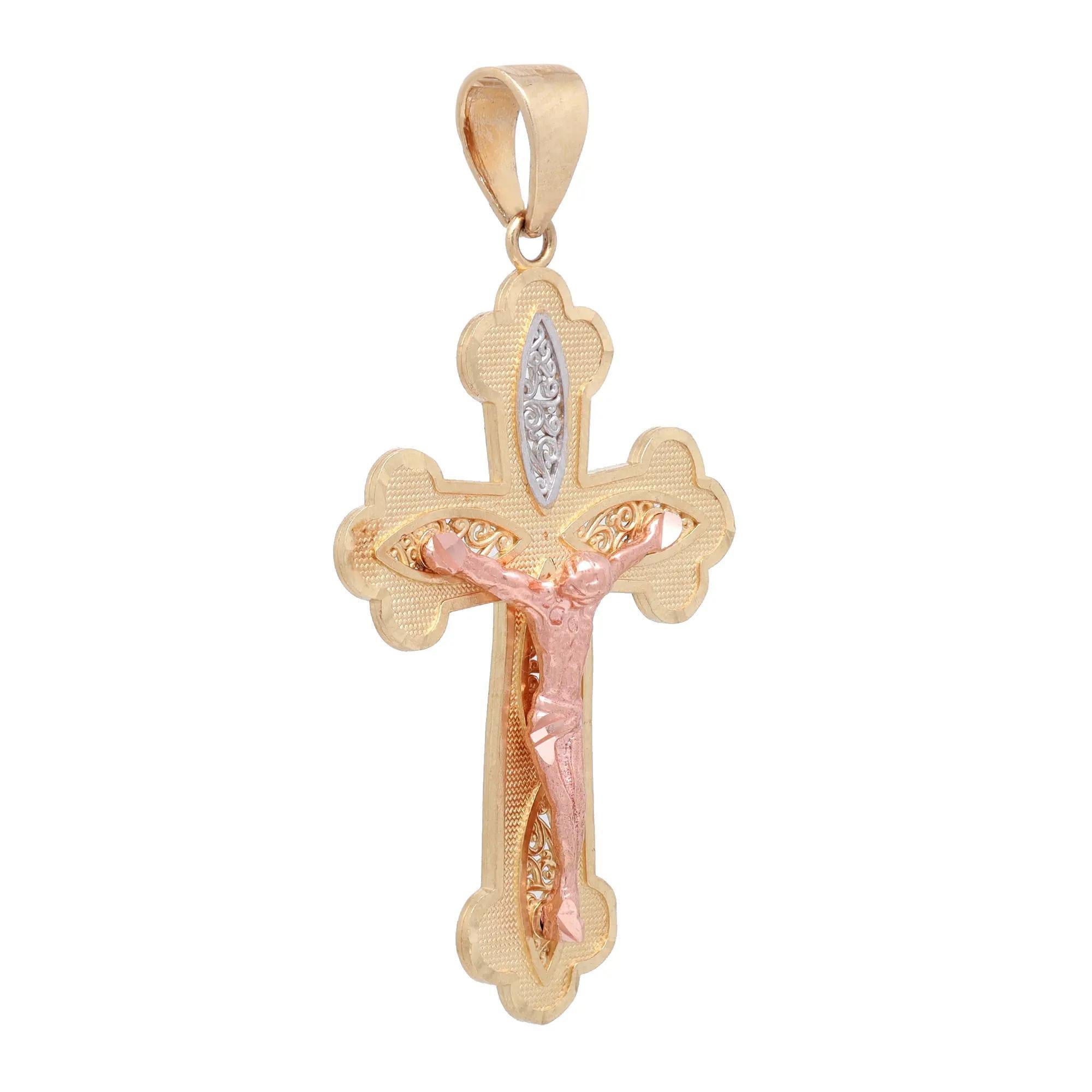 This meaningful cross pendant shines in lustrous 14K yellow, rose, and white gold. It features a crucifix filigree cross pendant in multi tone gold. Pendant size: 1.9 inches x 1 inch. Total weight: 4.20 grams. Minimalist and stylish, perfect for
