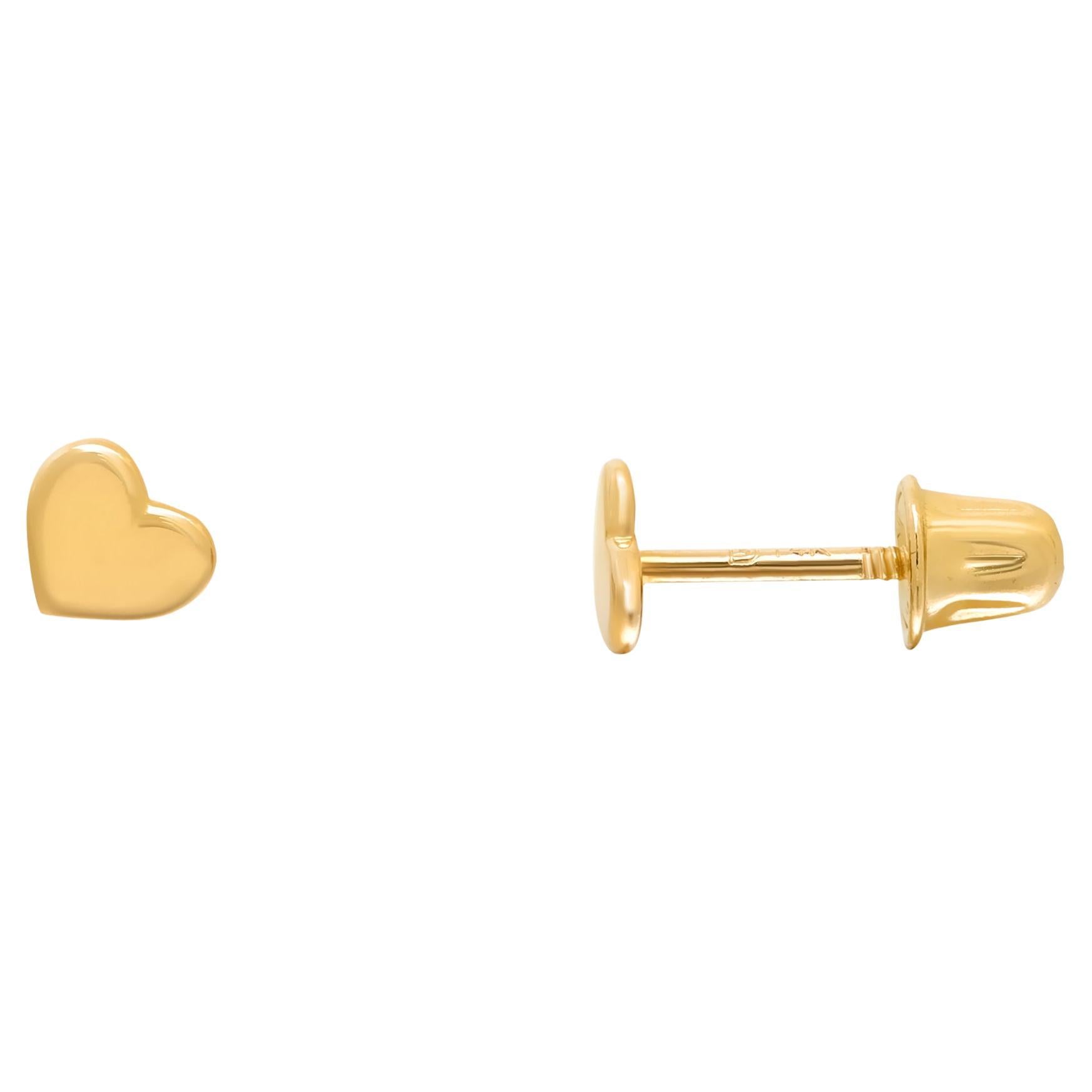 Sparkle love around you with these cute little hearts. Dainty and tiny, these heart stud earrings are easy and perfect for everyday wear. Crafted in highly polished 14K yellow gold. Earring size: 3.5mm. Secured with screw back posts. Great for