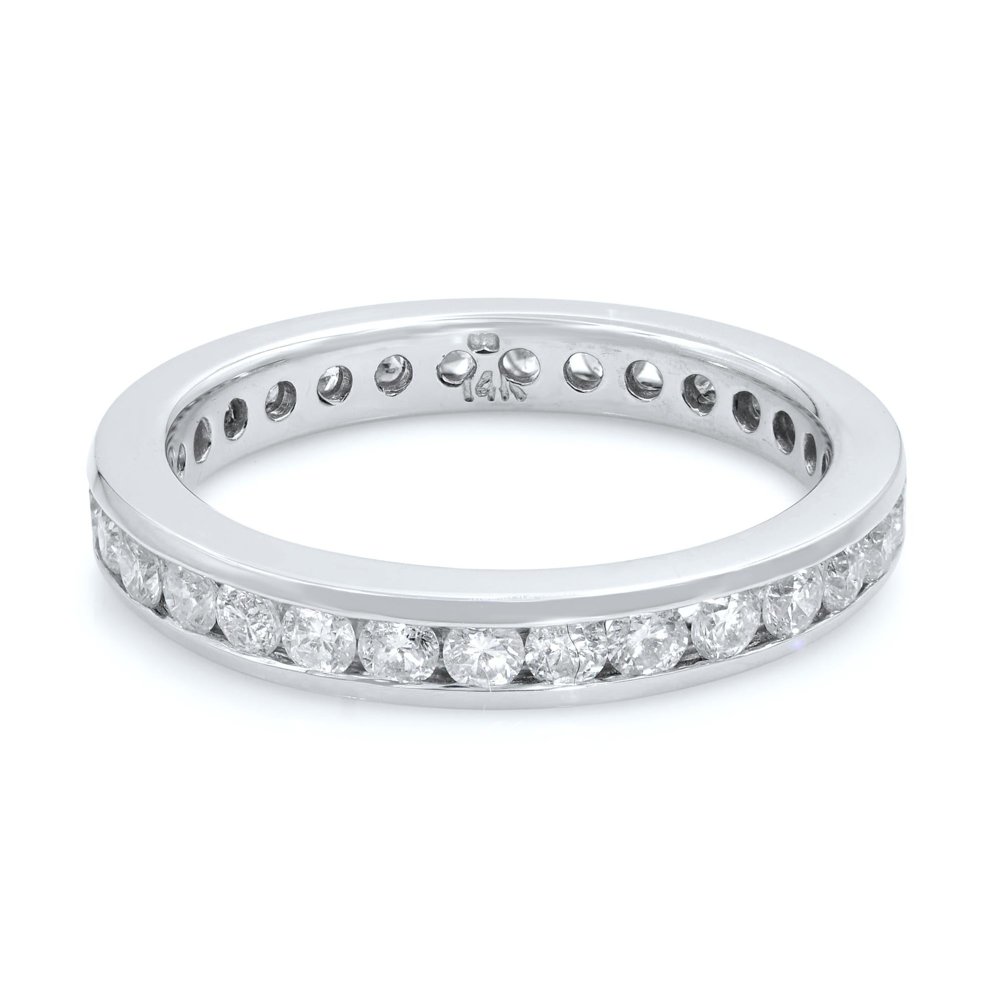 Celebrate your enduring love with this stunning wedding/anniversary band encrusted with sparkling diamonds. This elegant 14k white gold ring comes with round cut diamonds in channel setting all along the band. Total diamond carat weight is 0.60. The