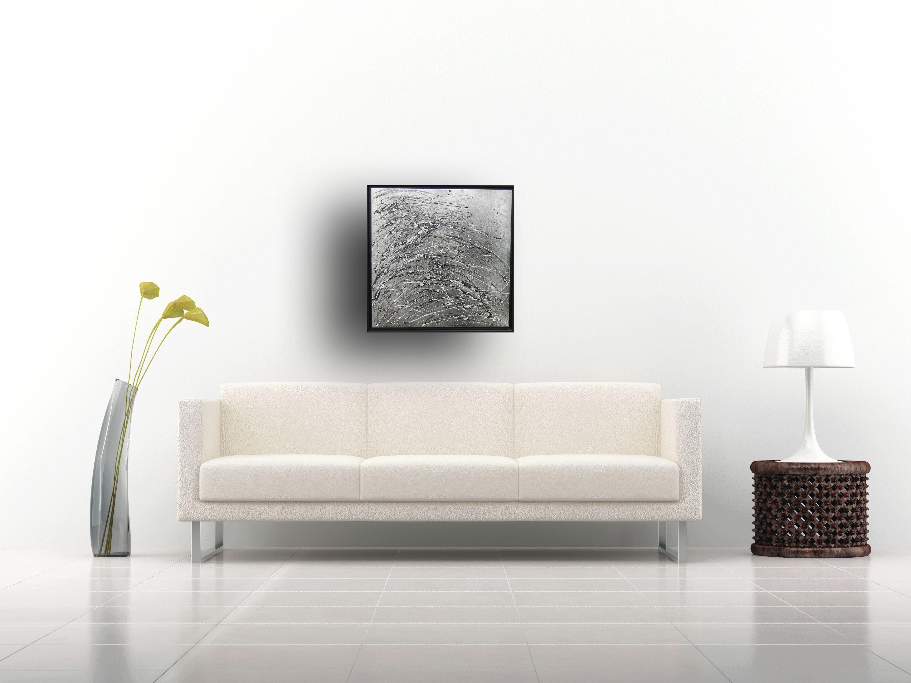 New artwork in the Argentum wave collection:-  A textured abstracted wave painting onto a slimline canvas presented in a black wooden floater frame.  Innovative use of mixed media, white acrylic and silver spray paints have been used to create