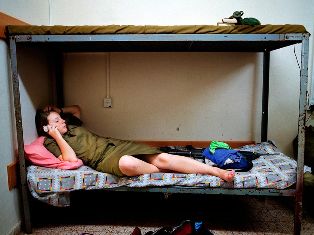 Rachel Papo Portrait Photograph - Talking to family during a break from basic training