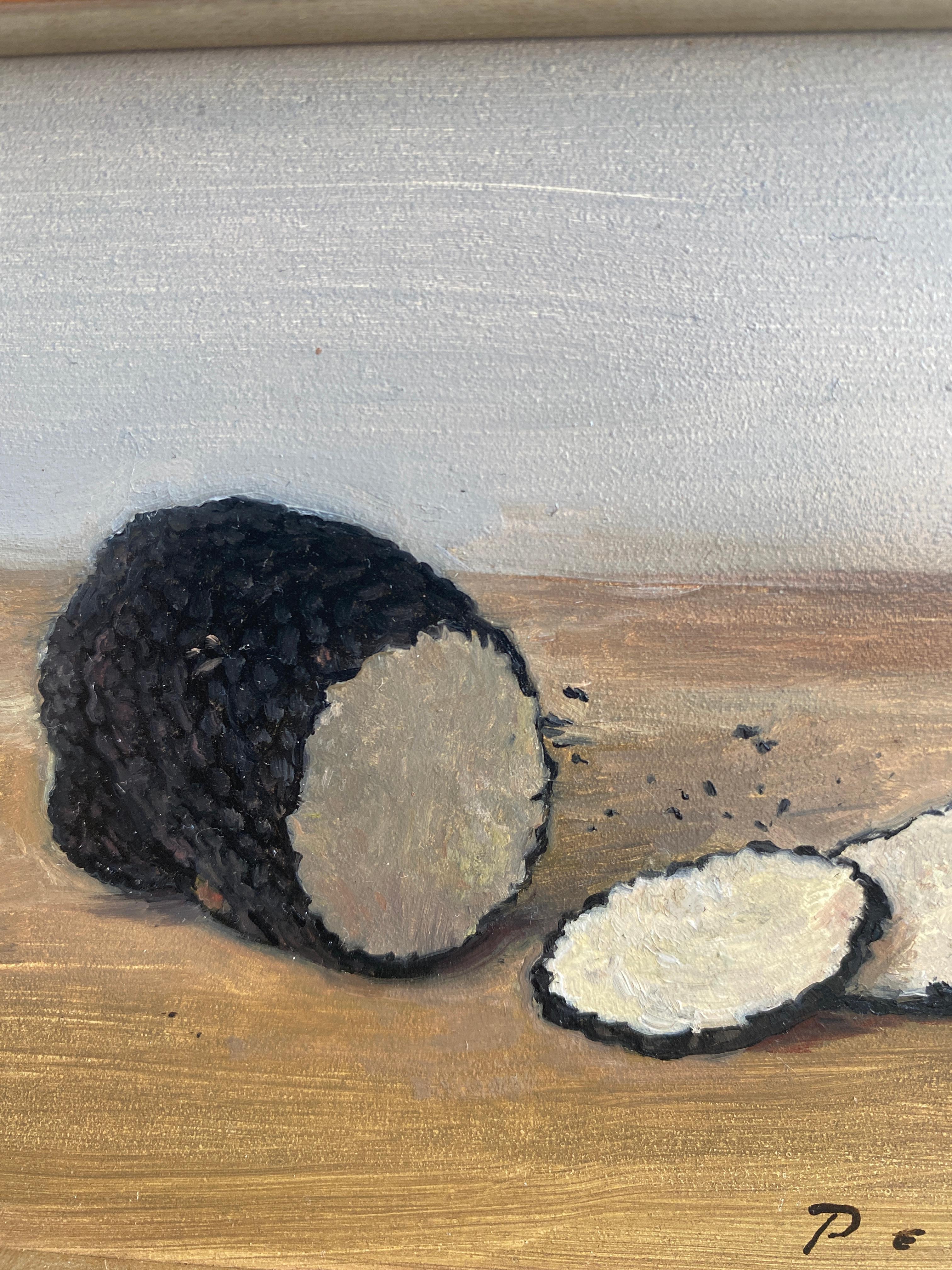 An oil painting of black truffles, being sliced. 

Painting dimensions: 4 x 5.63 inches

Artist Bio
Rachel Personett was born in Hawaii, but raised in Colorado. Being the daughter of a pilot she has always traveled extensively. She has studied part