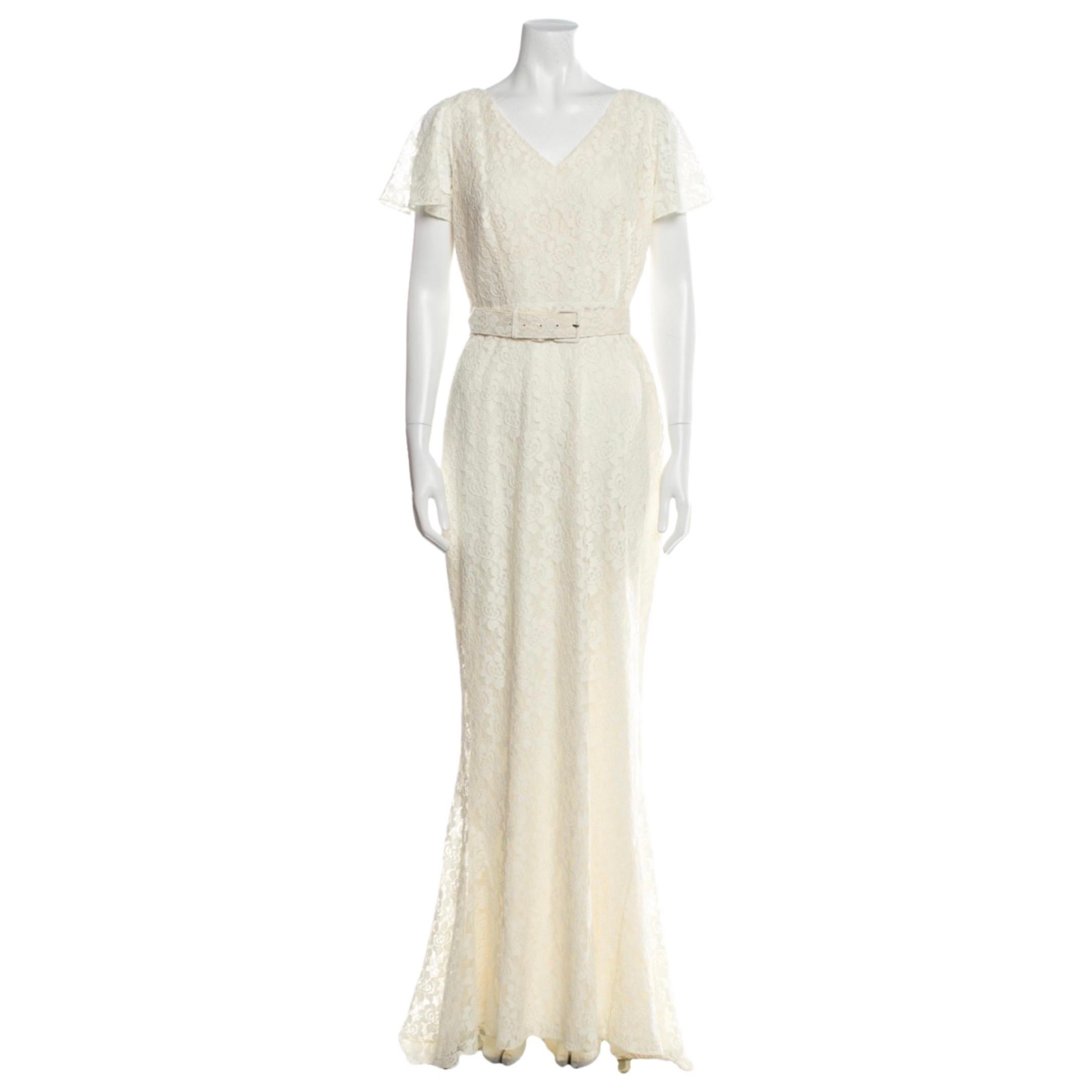 Rachel Zoe Lace Wedding Gown 

This belted gown is the stuff dreams are made of. This classic look is always luxurious in that it commands quite a presence, Rather, it simply means relying on immaculate tailoring, sleek necklines, and rich textures.