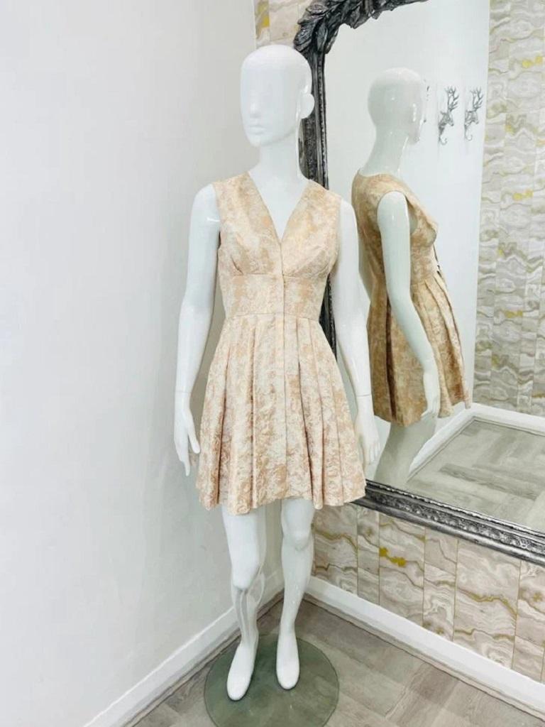 Rachel Zoe Jacquard Mini Dress

With gold metallic thread in skater style.

Additional information:
Size – 4US
Composition- 9% Metallic, 38% Cotton, 53% Polyester
Condition – Very Good/Excellent