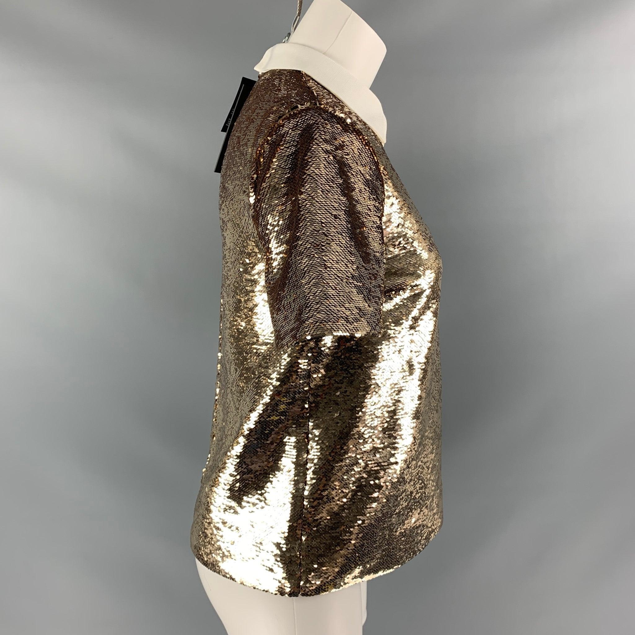 RACHEL ZOE dress top comes in gold polyester sequined fabric featuring a polo collar. New with Tags. 

Marked:   2 

Measurements: 
 
Shoulder: 15 inBust: 34 inSleeve: 8 inLength: 23 in
  
  
 
Reference: 112898
Category: Dress Top
More Details
   