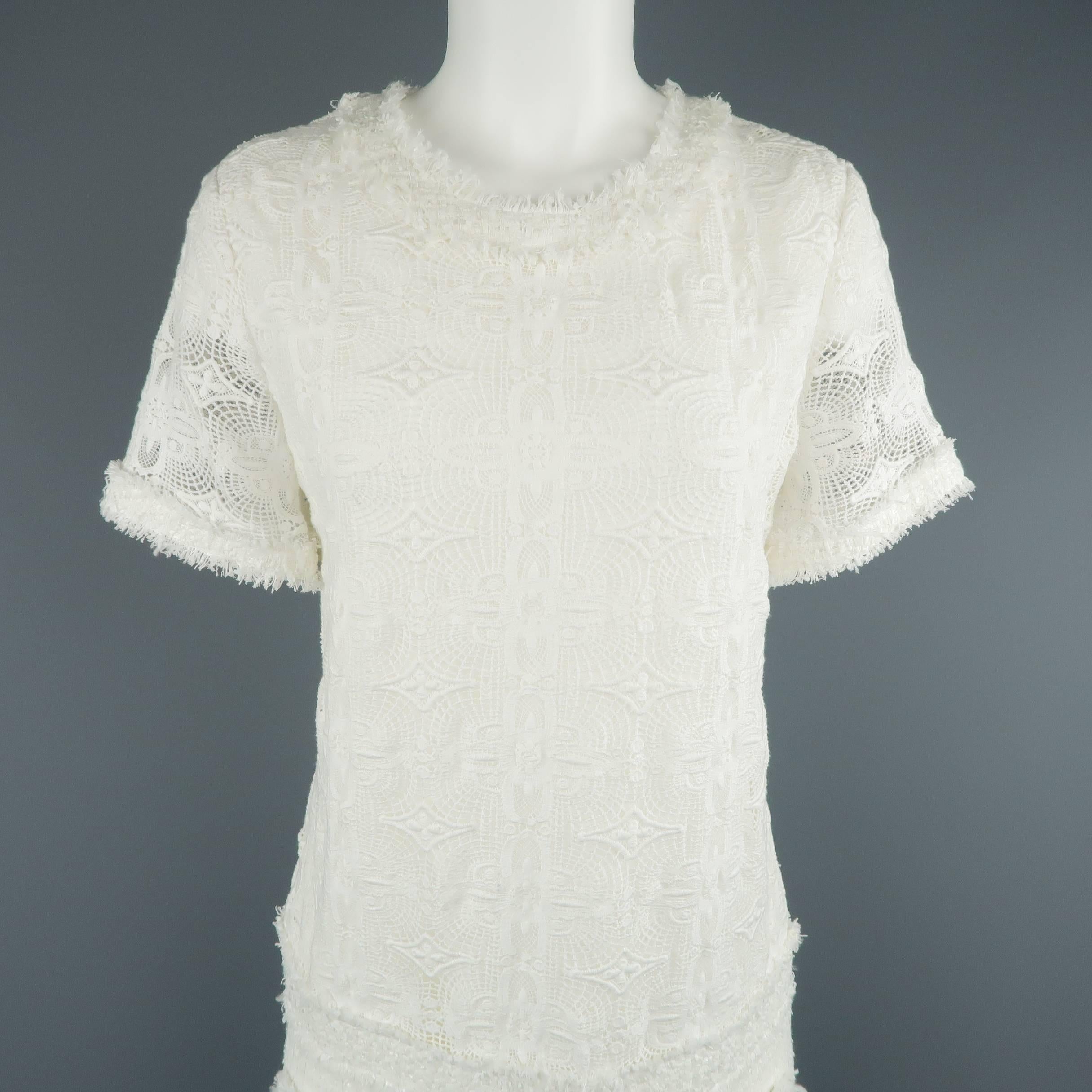 RACHEL ZOE short sleeve shift dress comes in white lace with a drop waist, tweed skirt, short sleeves, and tweed trim.
 
New with tags.
Marked: 6
 
Measurements:
 
Shoulder: 15 in.
Bust:  37 in.
Waist: 36 in.
Hip: 38 in.
Sleeve: 8 in.
Length: 34 in.
