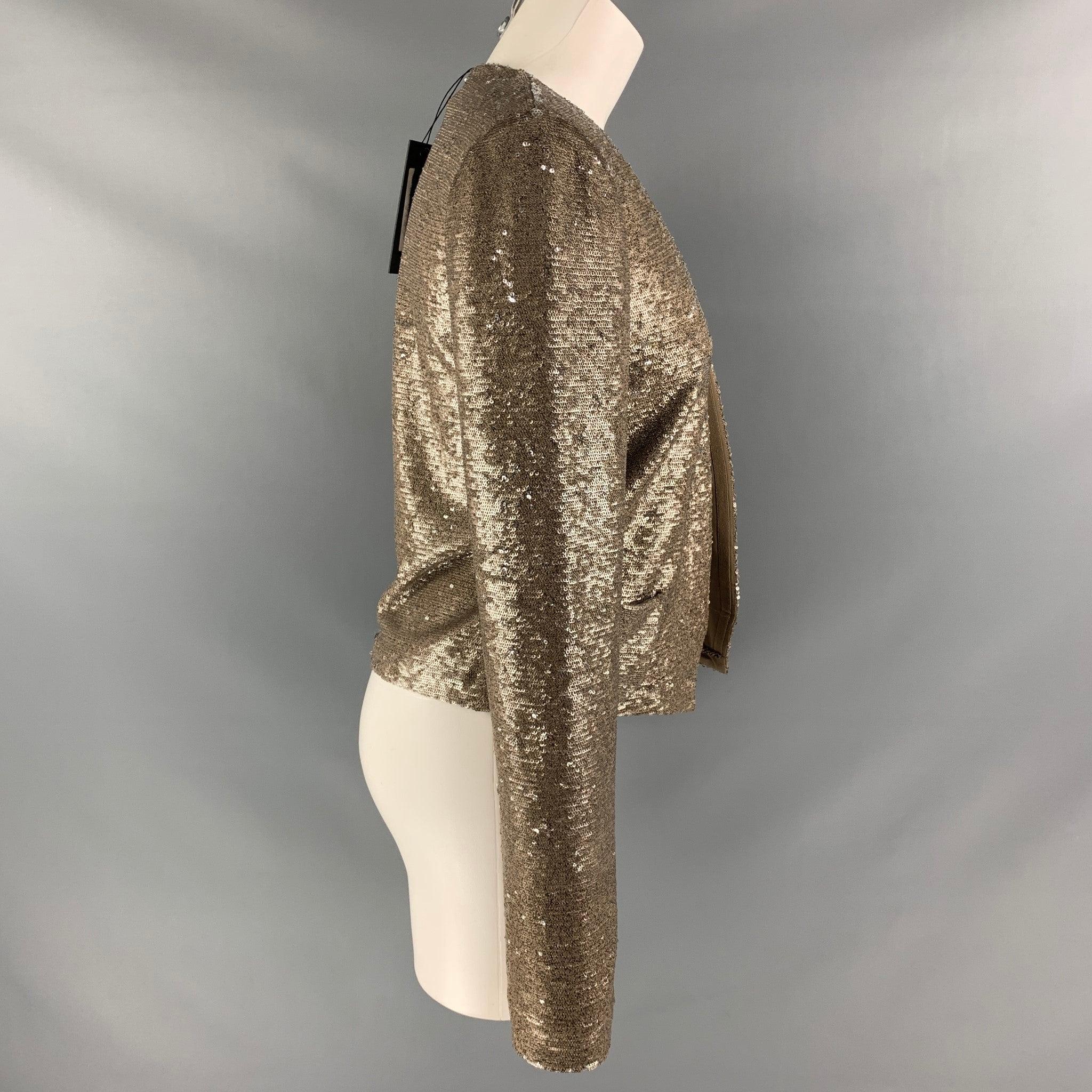 RACHEL ZOE jacket comes in gold polyester and spandex sequined fabric featuring two patch pockets at front. New with Tags. 

Marked:   2 

Measurements: 
 
Shoulder: 15 inBust: 32 inSleeve: 28 inLength: 20.5 in

  
  
 
Reference: 112900
Category:
