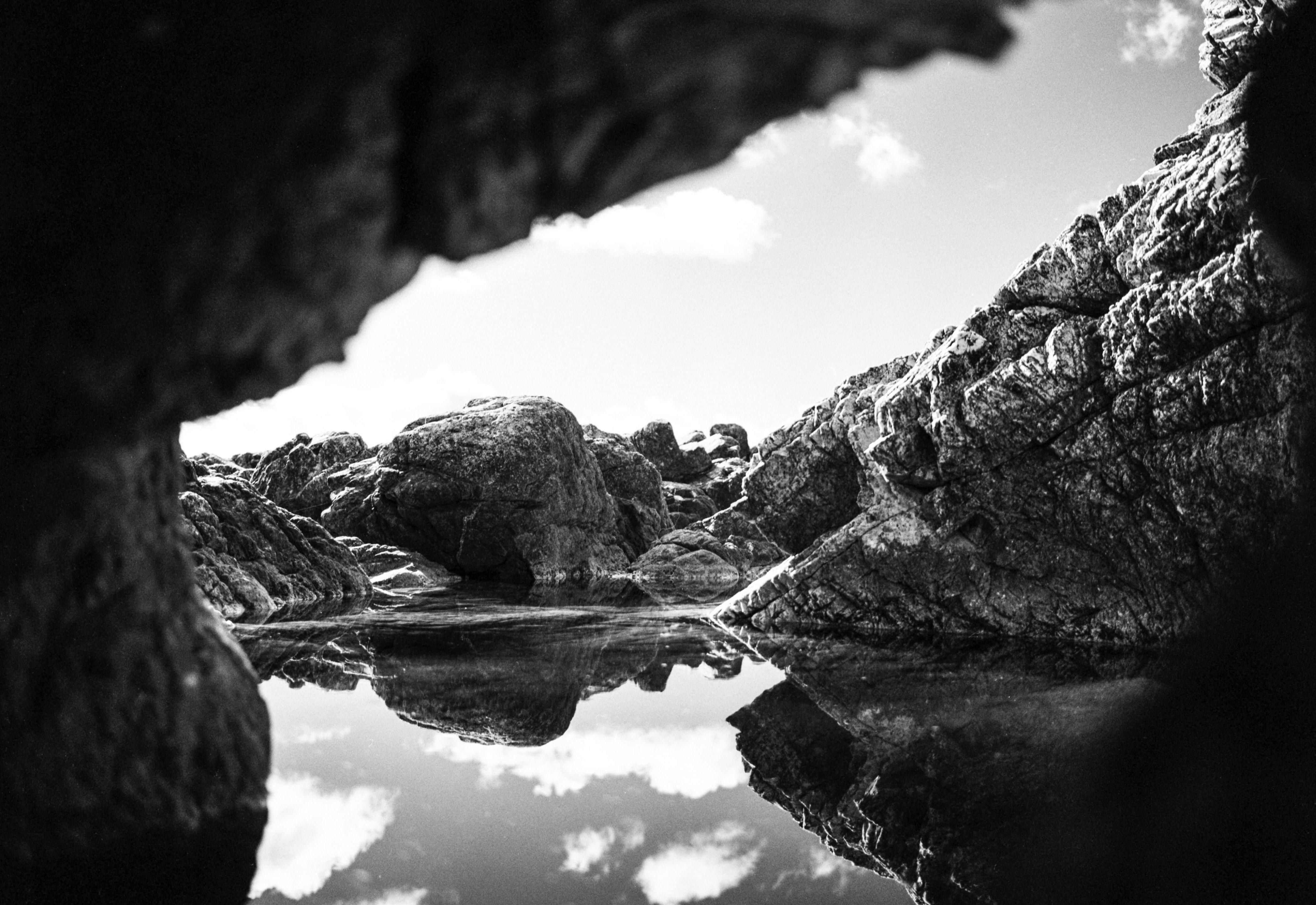 Rachell Hester Black and White Photograph - "Down the Rabbit Hole" An Infrared Silver Gelatin Photograph of a Tide Pool