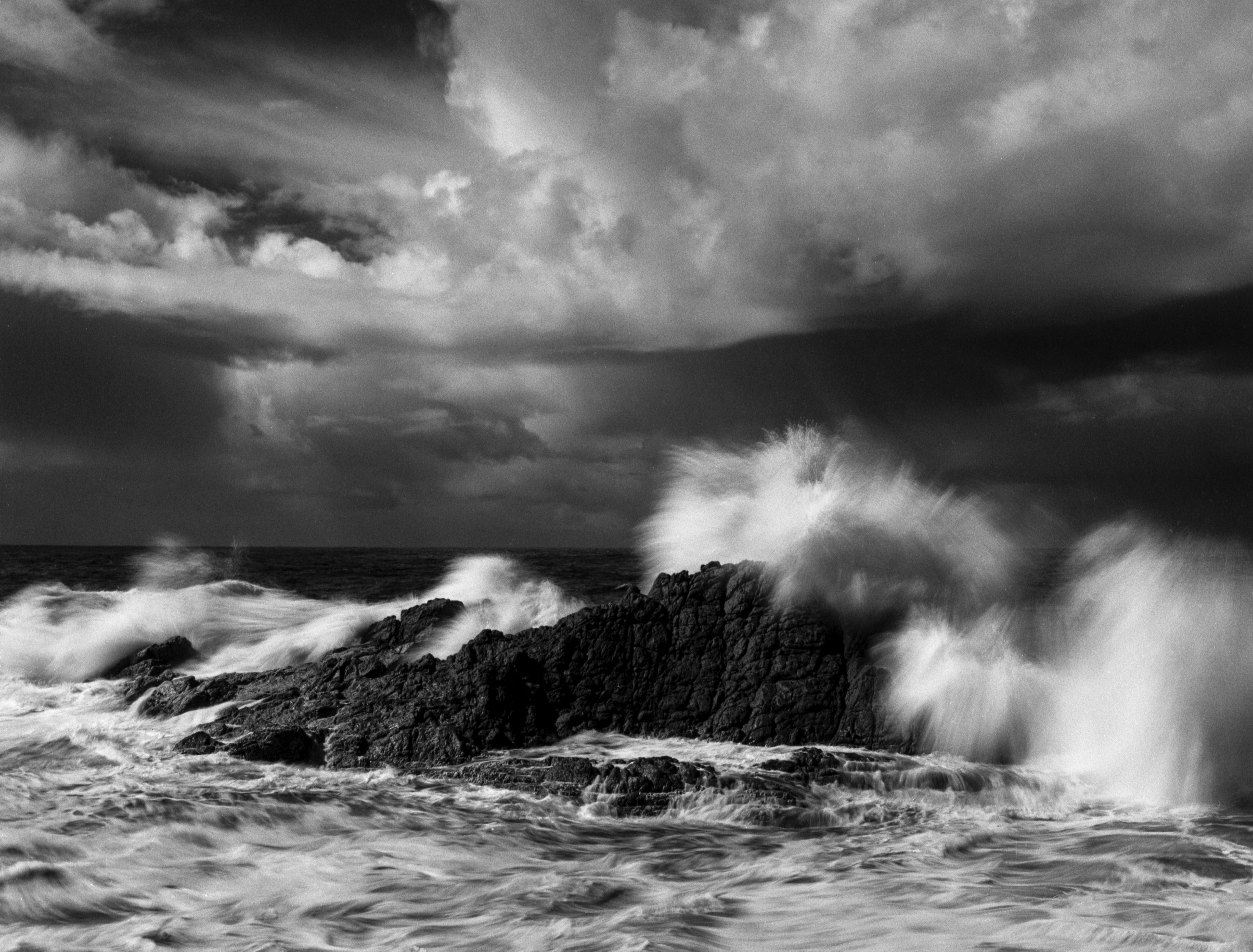 Rachell Hester Black and White Photograph - "The Wave" A Moody, Infrared Silver Gelatin Photograph of a Crashing Wave