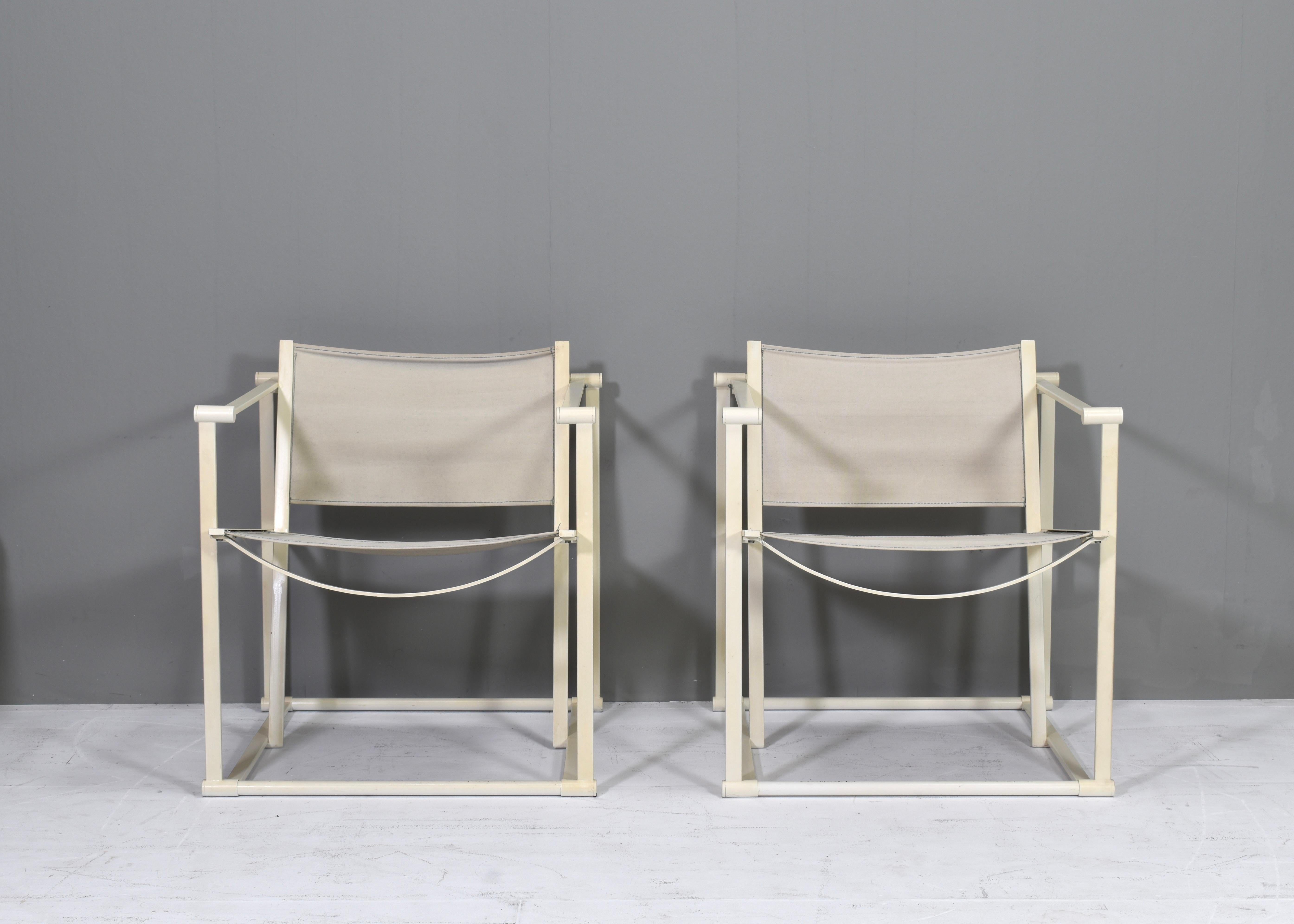 Iconic and minimalistic cube lounge chairs by Radboud van Beekum for PASTOE - Netherlands, 1981. The chairs are made of creme lacquered metal with original canvas upholstery. Although not necessary we can on request change the upholstery to for
