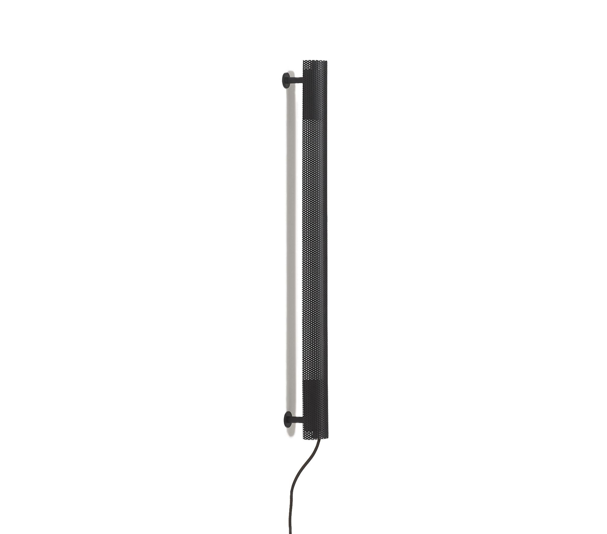 Radent wall lamp is based on a standard LED light and is a slim radiant linear wall lamp. The Radent Wall Lamp is available in two sizes with a black, white or brass finish. Measure: 700 mm.