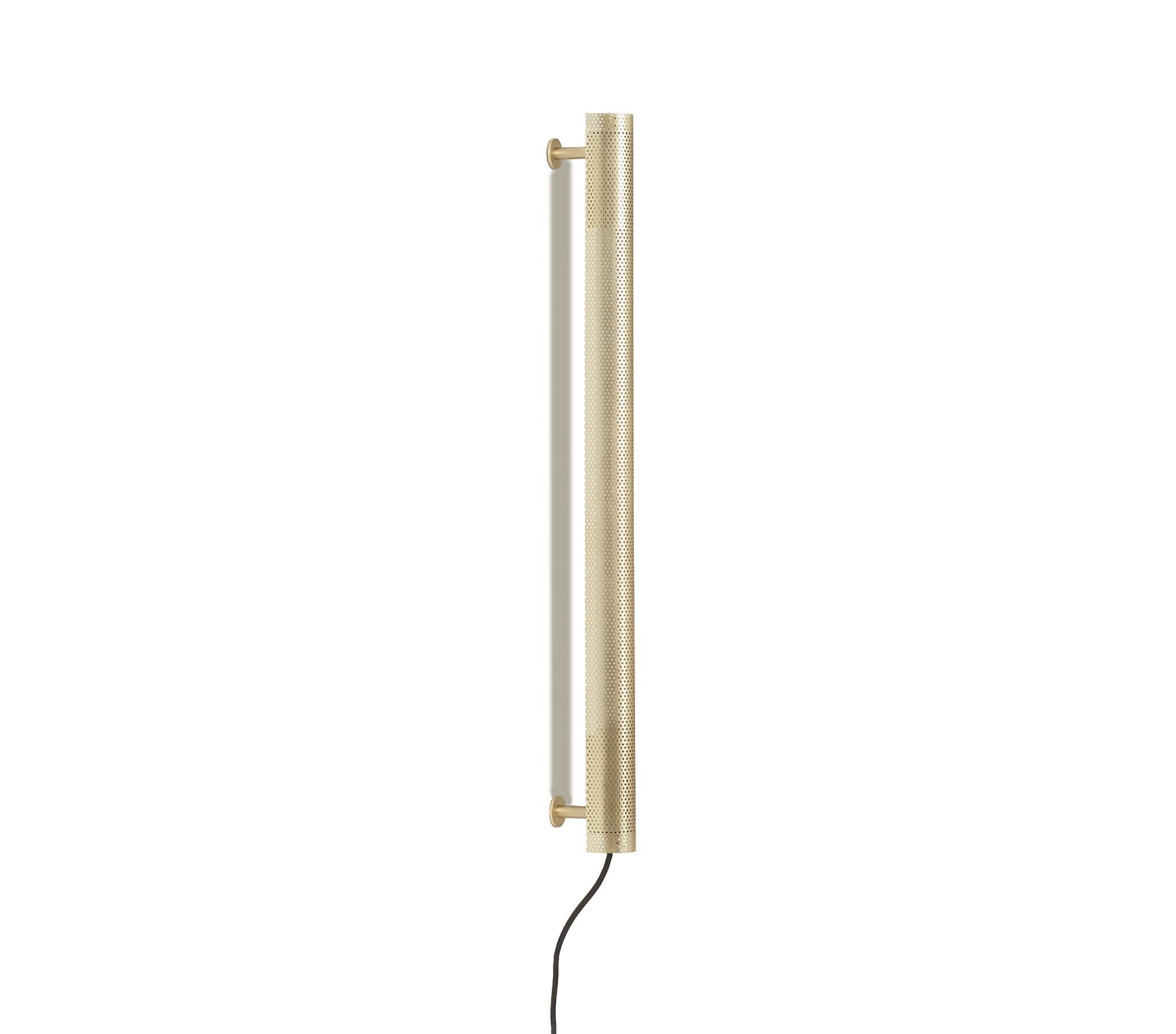 Radent wall lamp is based on a standard LED light and is a slim radiant linear wall lamp. The Radent Wall Lamp is available in two sizes with a black, white or brass finish. Measures: 70mm.