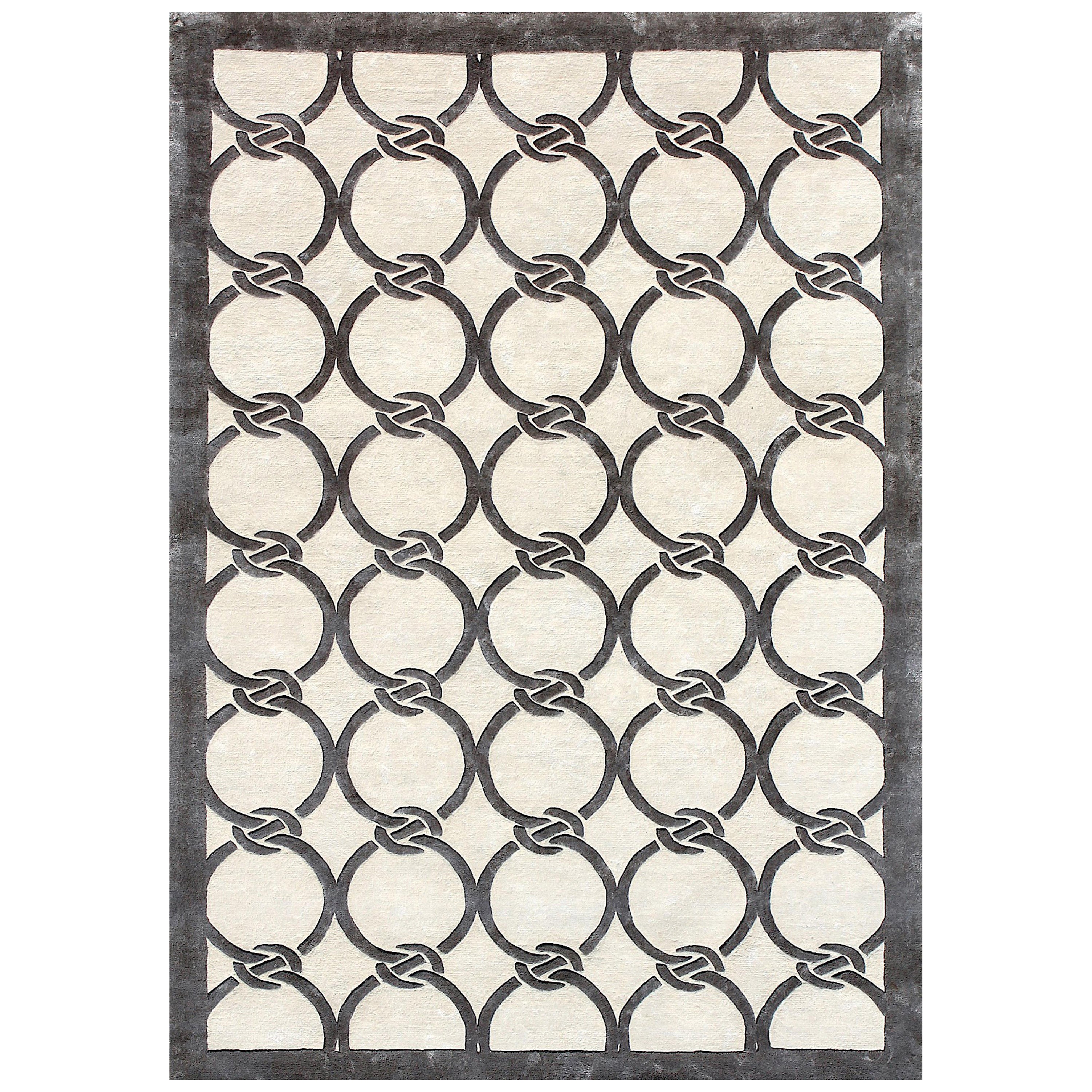 RADIAL Alfombra de seda geométrica moderna tejida a mano en color marfil a mano en venta