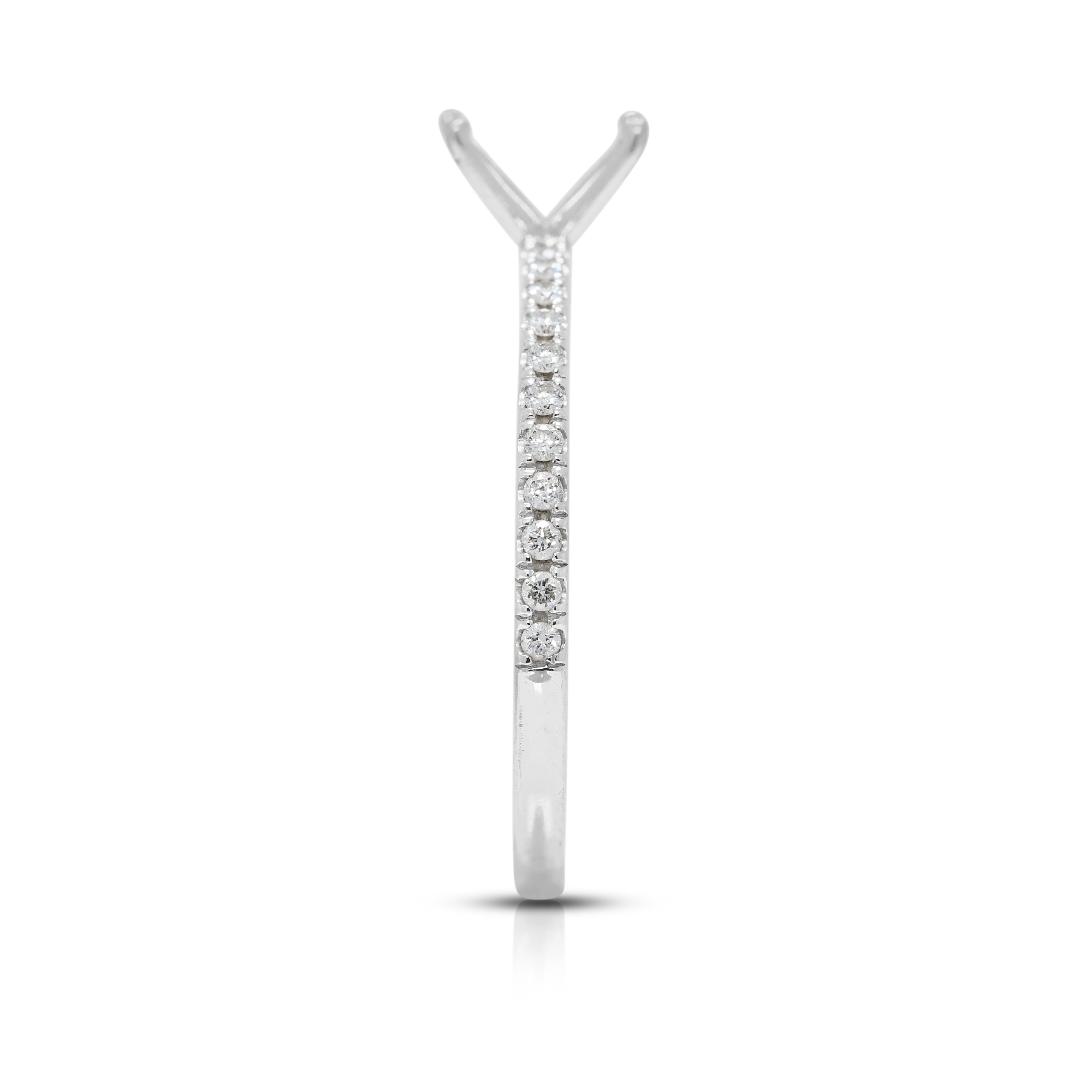 This pre-owned 18K white gold ring setting gleams with sophistication, accentuated by 22 round brilliant natural diamonds totaling 0.15 carats. With G-color, VS clarity stones, each diamond radiates a soft yet striking brilliance, perfectly