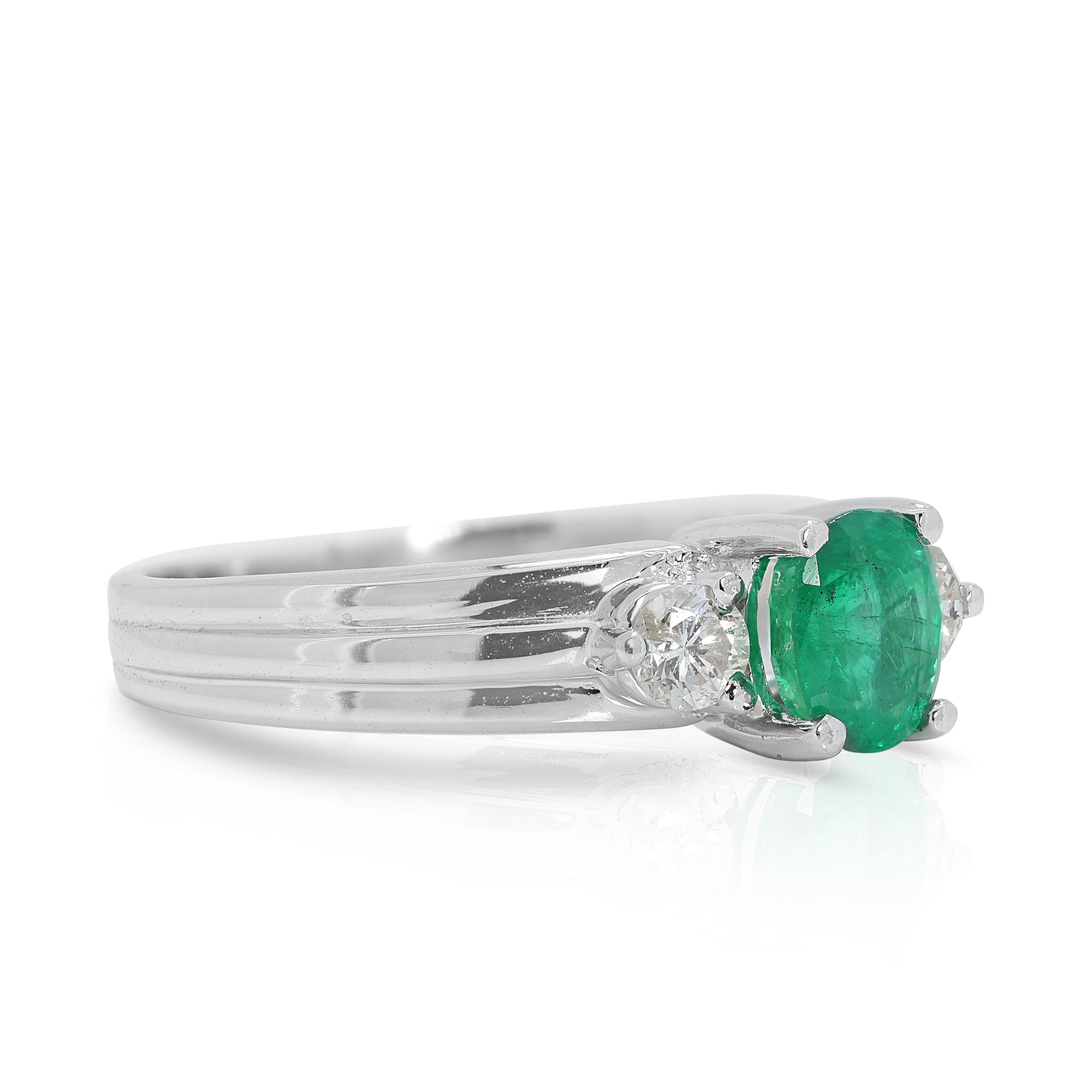 Oval Cut Radiant 0.26 carat Emerald Ring with Natural Diamonds in 18K White Gold