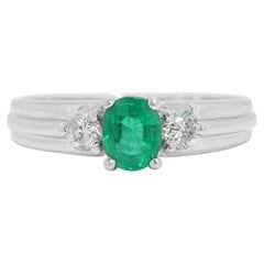 Radiant 0.26 carat Emerald Ring with Natural Diamonds in 18K White Gold