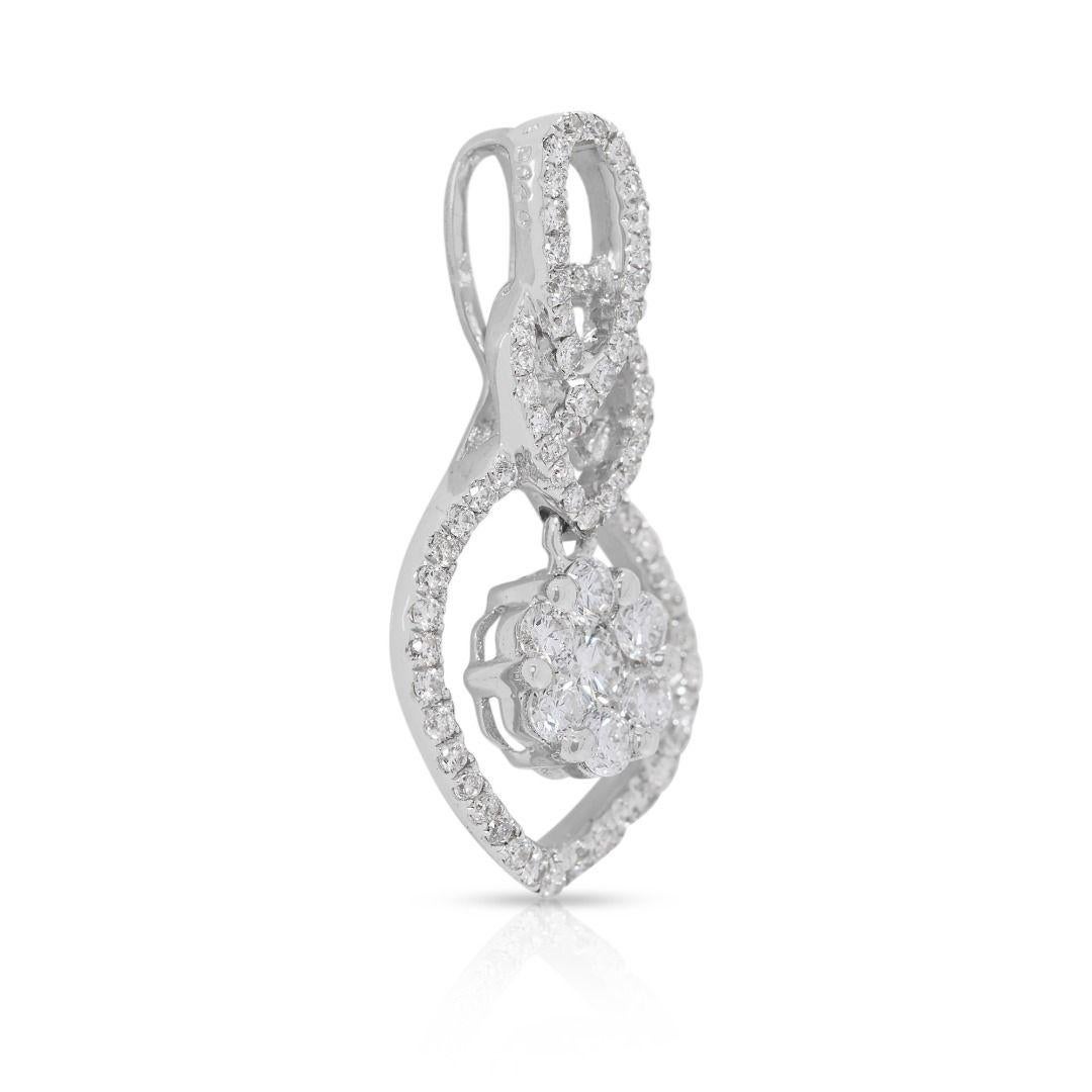 A masterpiece of brilliance and refinement, this 18K white gold pendant showcases 73 round brilliant-cut natural diamonds, totaling 0.4 carats, arranged in a striking pear-shaped halo with a captivating cluster style. The G color and VS clarity
