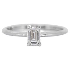 Bague solitaire taille émeraude de 0,70 carat en or blanc 18 carats - GIA 