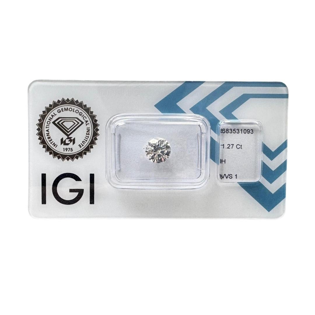 Radiant 1.27ct Triple Excellent Ideal Cut Round-Shaped Diamond - IGI Certified

This exceptional 1.27ct round diamond is a true symbol of refined brilliance. With a triple excellent ideal cut, it offers maximum light performance and sparkle from