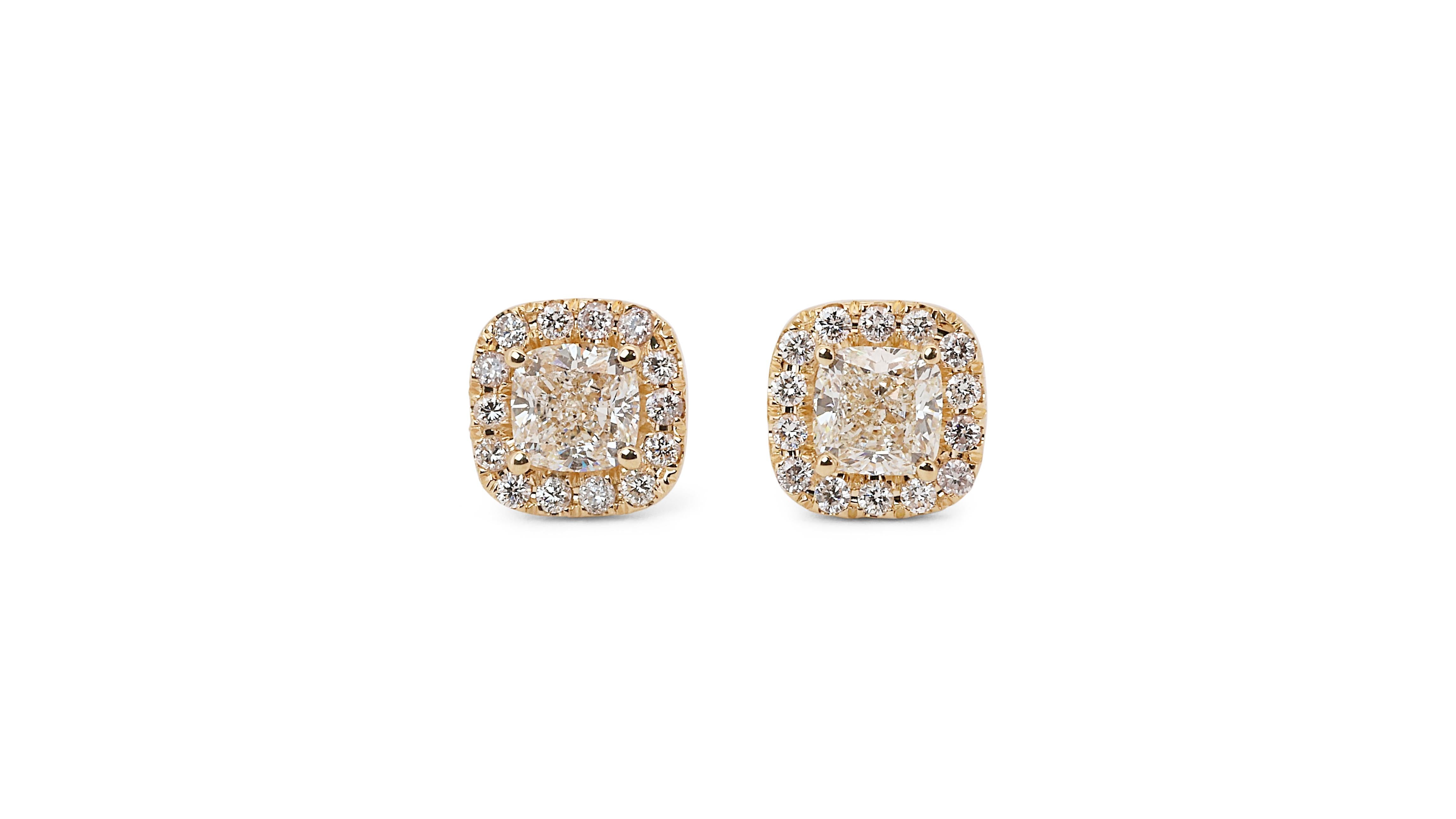 Radiant 14k Yellow Gold Natural Diamond Halo Stud Earrings w/2.57 ct - IGI Certified

These captivating halo stud earrings, crafted in gleaming 14k yellow gold showcase a dazzling display of diamonds. Each earring features a stunning square cushion