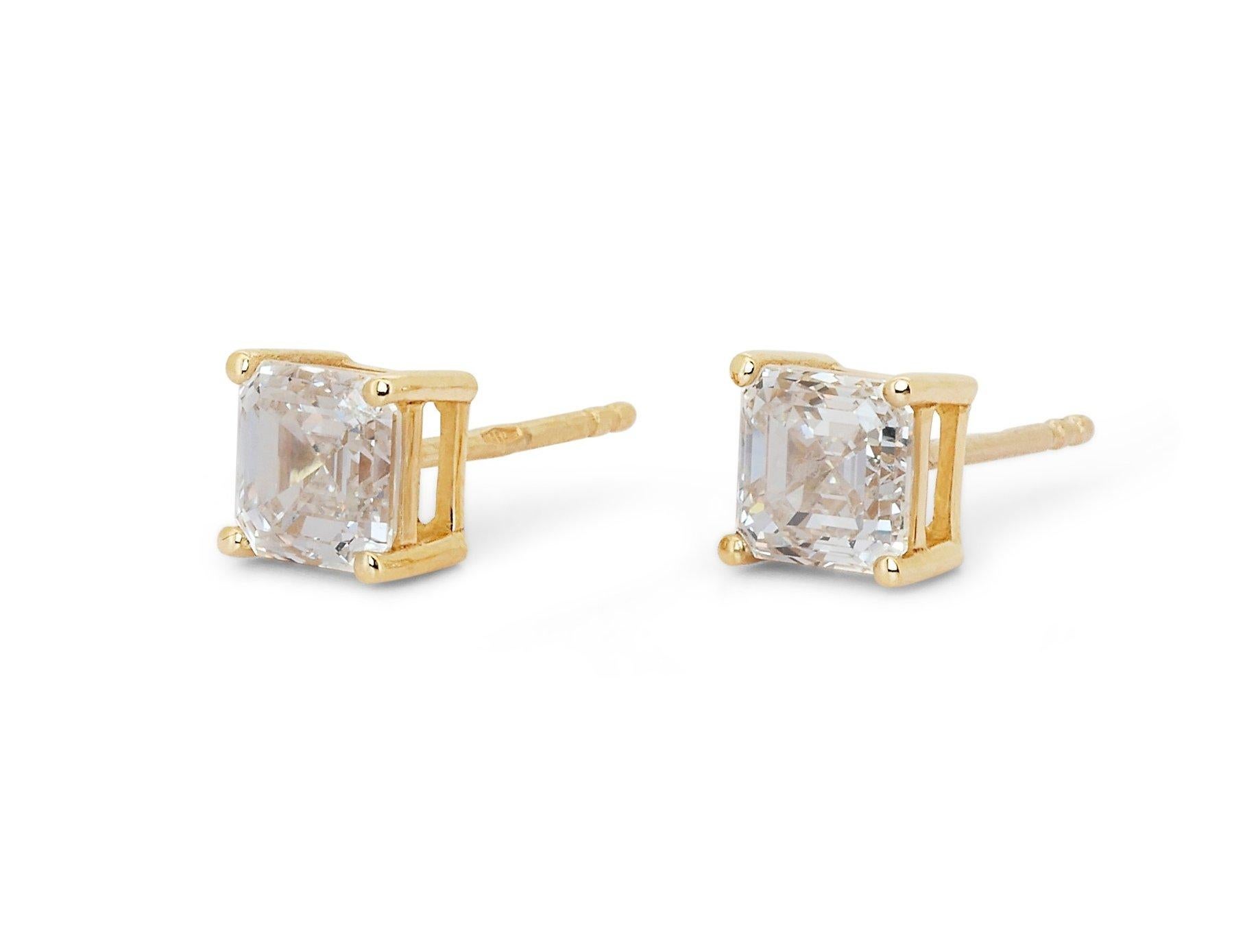 Radiant 2.00ct Diamonds Stud Earrings in 18k Yellow Gold - GIA Certified

These exquisite stud earrings crafted in 18k yellow gold showcase two breathtaking square-cut diamonds, totaling 2.00 carats. Certified by GIA, these diamonds sparkle with