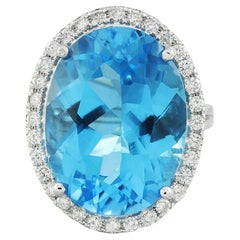 Étincelante bague en or blanc massif 14 carats avec topaze bleue suisse et diamants