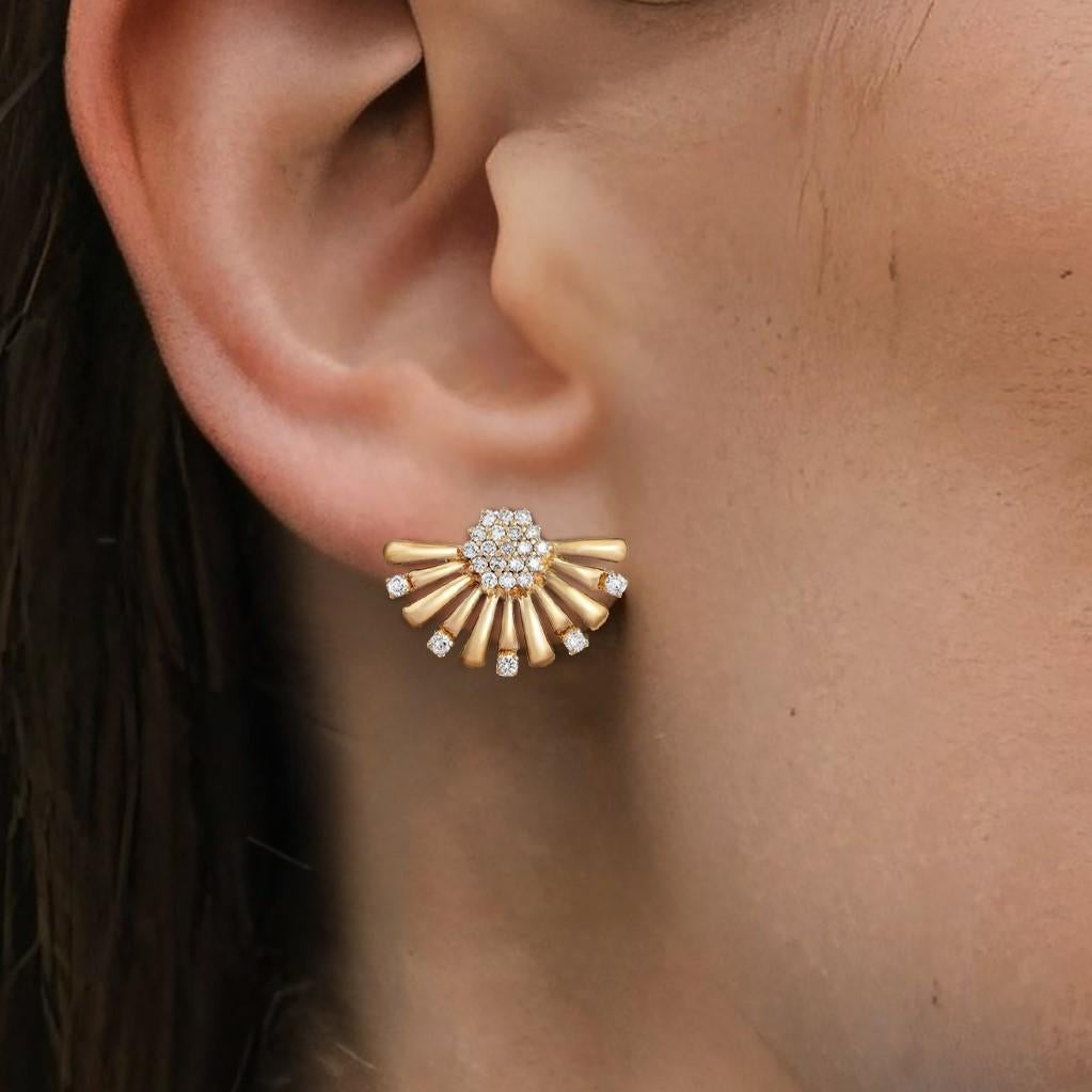 Elevate your style with the timeless elegance of the Radiant Burst Diamond 14K Yellow Gold Cluster Stud Earrings . Crafted in luxurious 14K yellow gold, these earrings feature dazzling natural fancy diamonds with a carat weight of 0.6CT, exuding