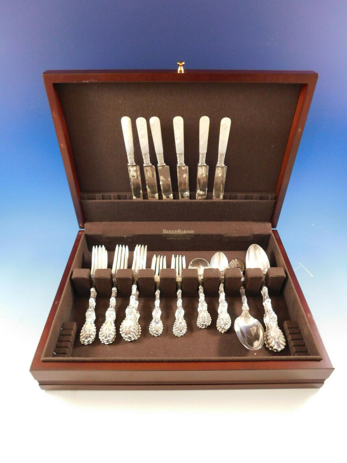 Gorgeous Radiant by Whiting sterling silver flatware set of 42 pieces. Great starter set! This set includes:

6 knives with mother of pearl handles with floral sterling band and plated blunt blades, 8 1/2