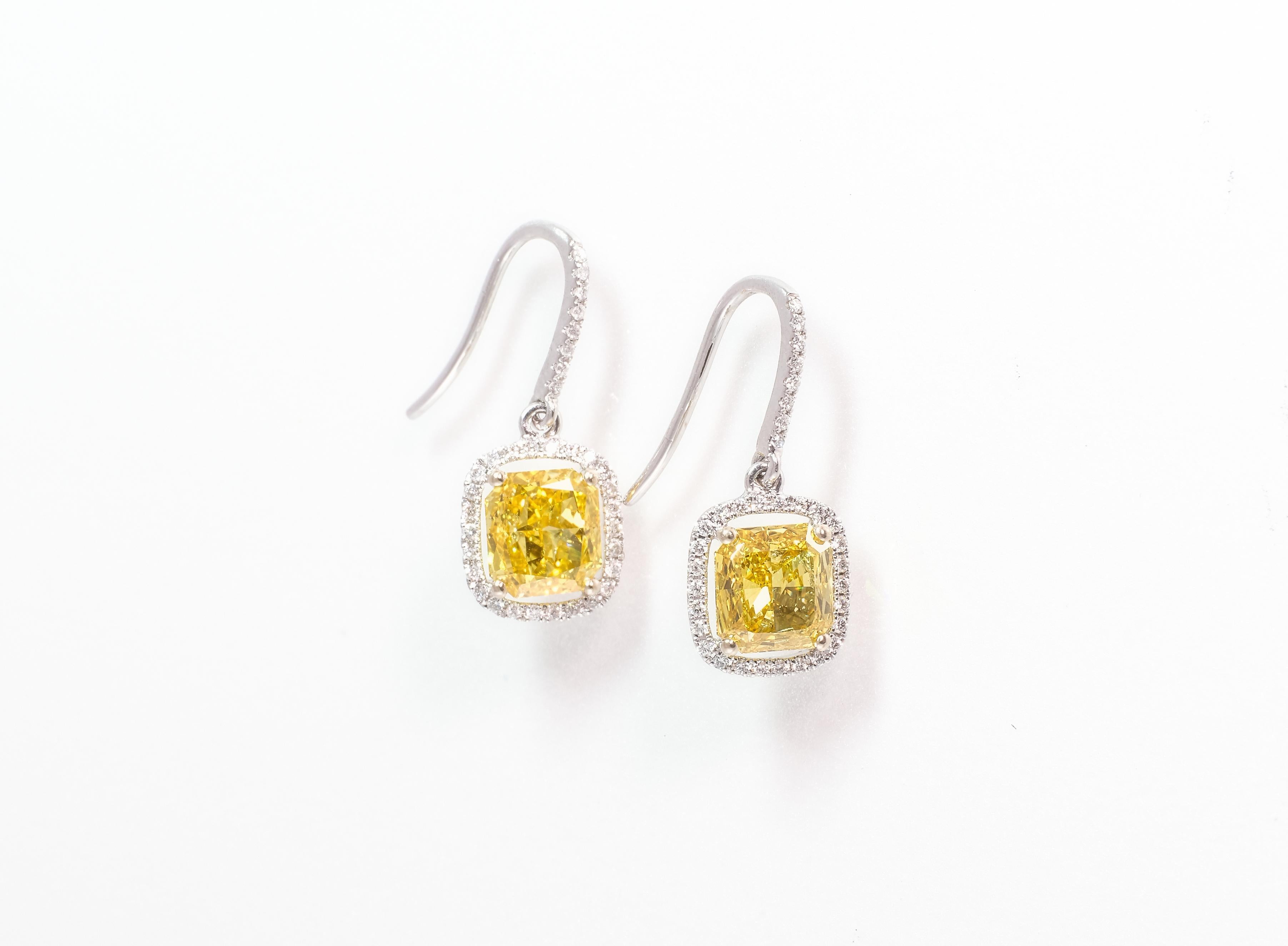 Radiant Cut 2.04 Carat Fancy Vivid Yellow Diamond Drop Earrings GIA For Sale