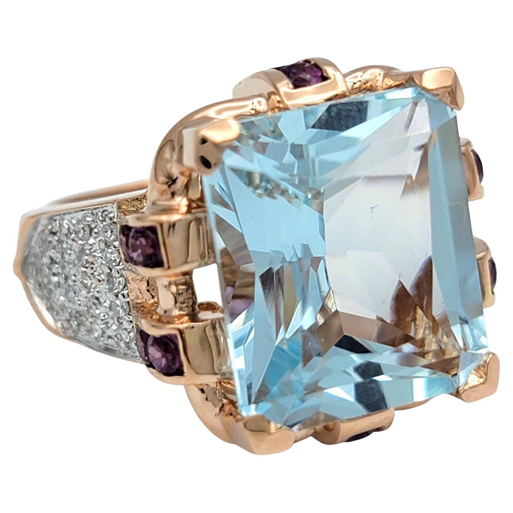 Ring Size: 6

This bold cocktail ring centers around a radiant-cut 8.92 carat aquamarine with a light blue hue, set in gleaming 14 karat rose gold. The stone's crisp facets are showcased in it's prong setting, while its color contrasts beautifully