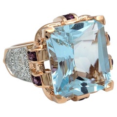 Radiant Cut Aquamarine Ring with Pink Sapphires & Diamonds in 14 Karat Rose Gold