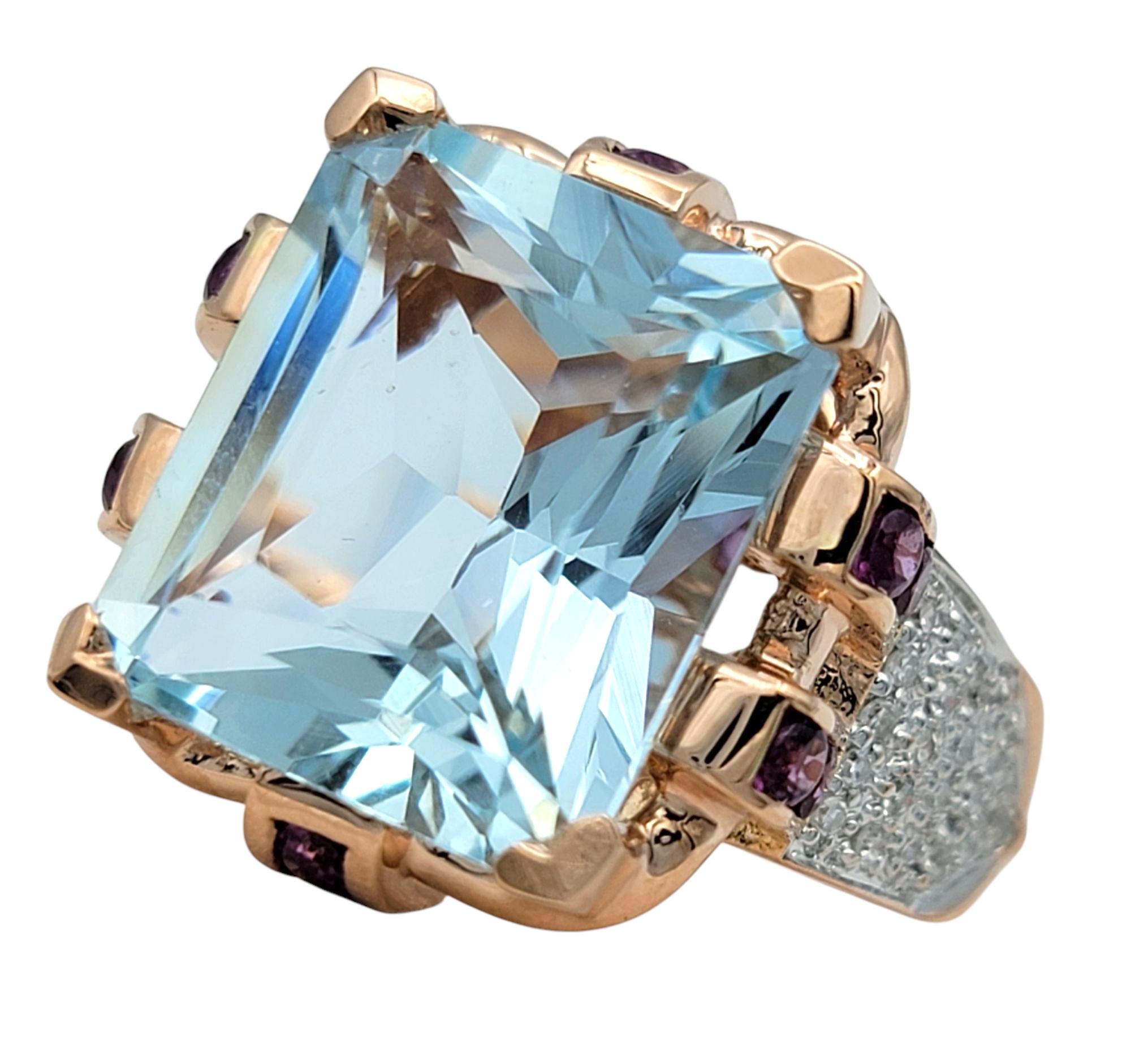 Contemporary Radiant Cut Aquamarine Ring with Pink Sapphires & Diamonds in 14 Karat Rose Gold For Sale