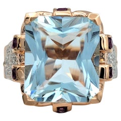 Radiant Cut Aquamarine Ring with Pink Sapphires & Diamonds in 14 Karat Rose Gold