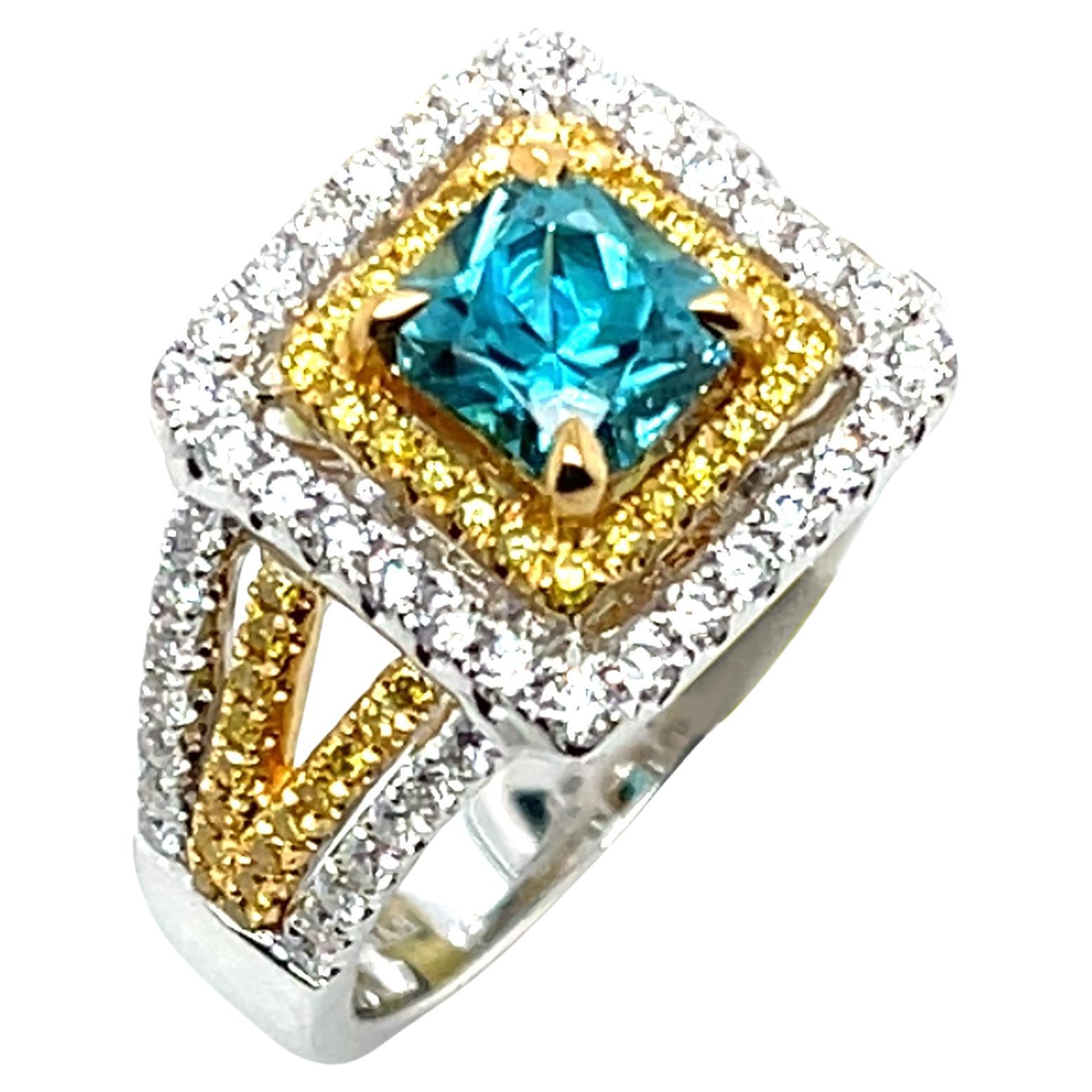 Bague en or 18k avec halo de zircon bleu, diamant blanc et diamant jaune de taille radieuse en vente