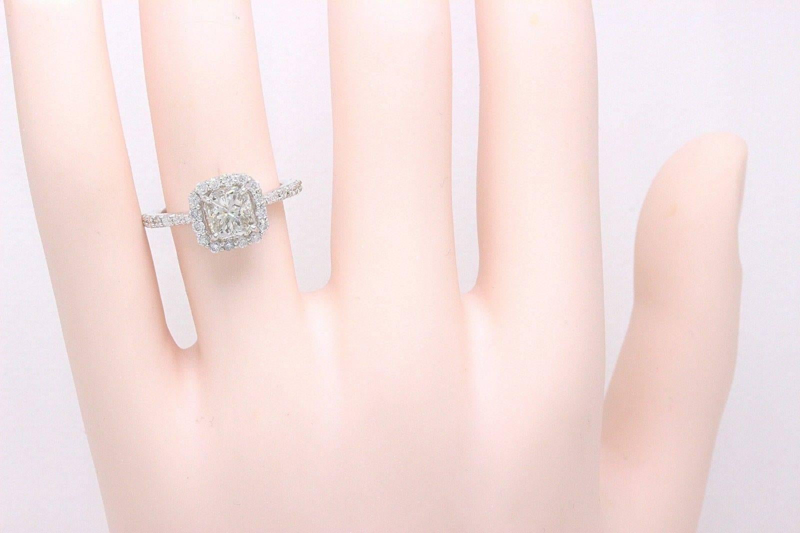 Women's Radiant Cut Diamond Engagement Ring 1.70 Carat Halo Design in 14 Karat Gold For Sale