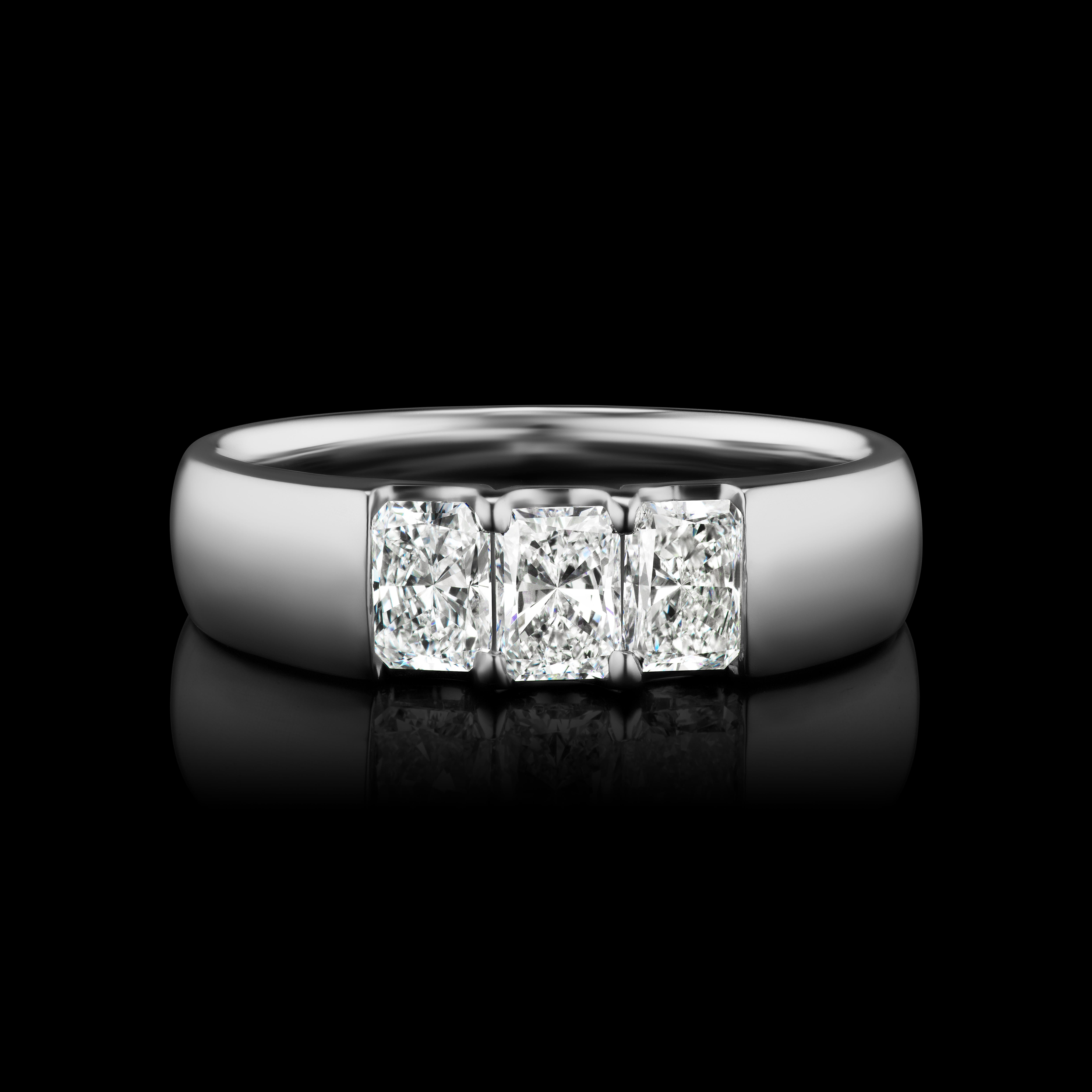 Radiant Cut Diamond Anniversary Ring in 14K White Gold ( 1.43 ct. tw. )

This diamond ring is made using Rectangular Radiant diamonds which are elegantly set in a straight line, which gives it a very classic look. Made with matching 50 Rectangular