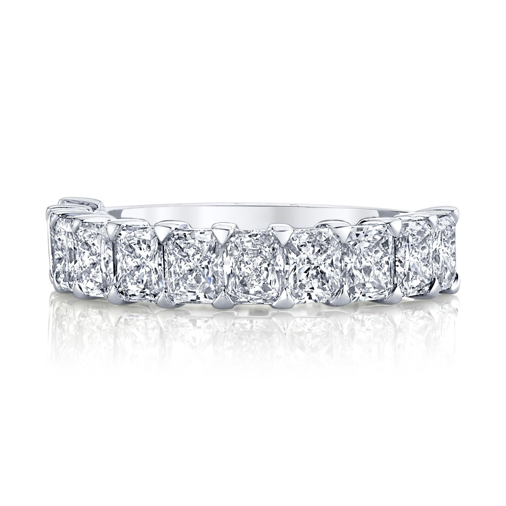 11 Radiant Cut Diamonds set in platinum half way eternity band.
2.10 carat total weights 
Ring size 6.5
Approximate Color F +  Clarity VVS-VS  

*Can be resized by your trusted jeweler or we can resize them for you.