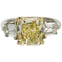Radiant Cut Fancy Yellow Three-Stone Diamond Engagement Ring