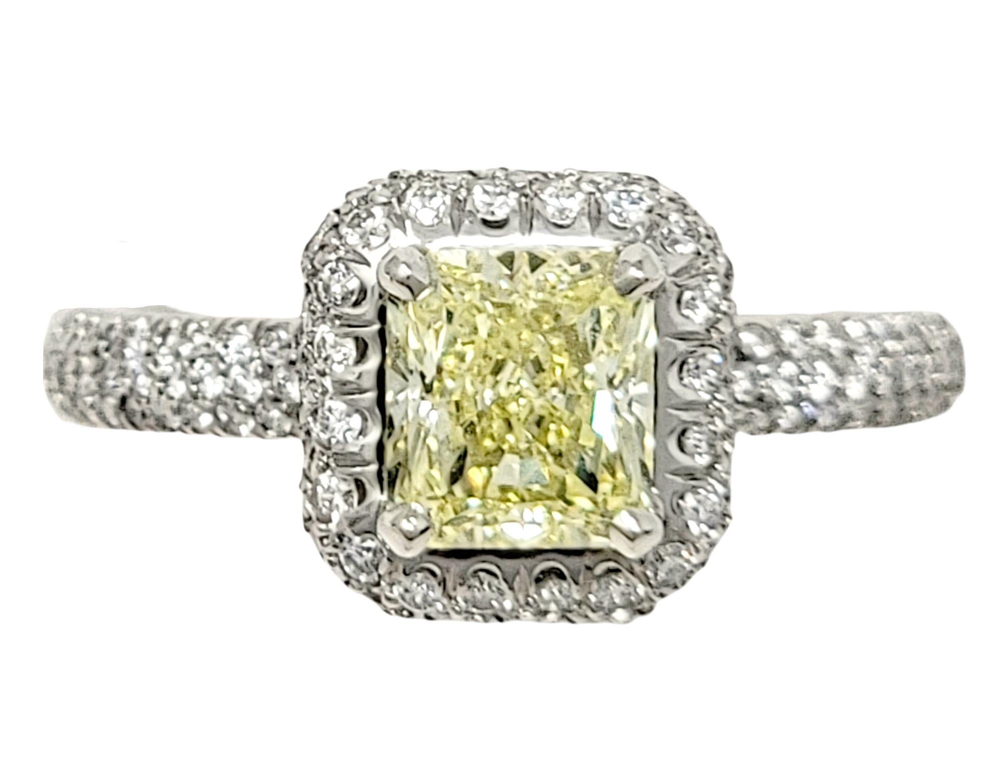 Ring size: 6

This absolutely exquisite engagement ring combines white and yellow diamonds in a modernized classic design that showcases the color and brilliance of both. The breathtaking ring features a sparkling radiant cut 1.41 carat Natural