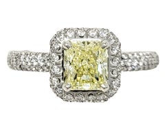 Radiant Cut Natural Fancy Yellow Diamond and Halo Platinum Engagement Ring GIA
