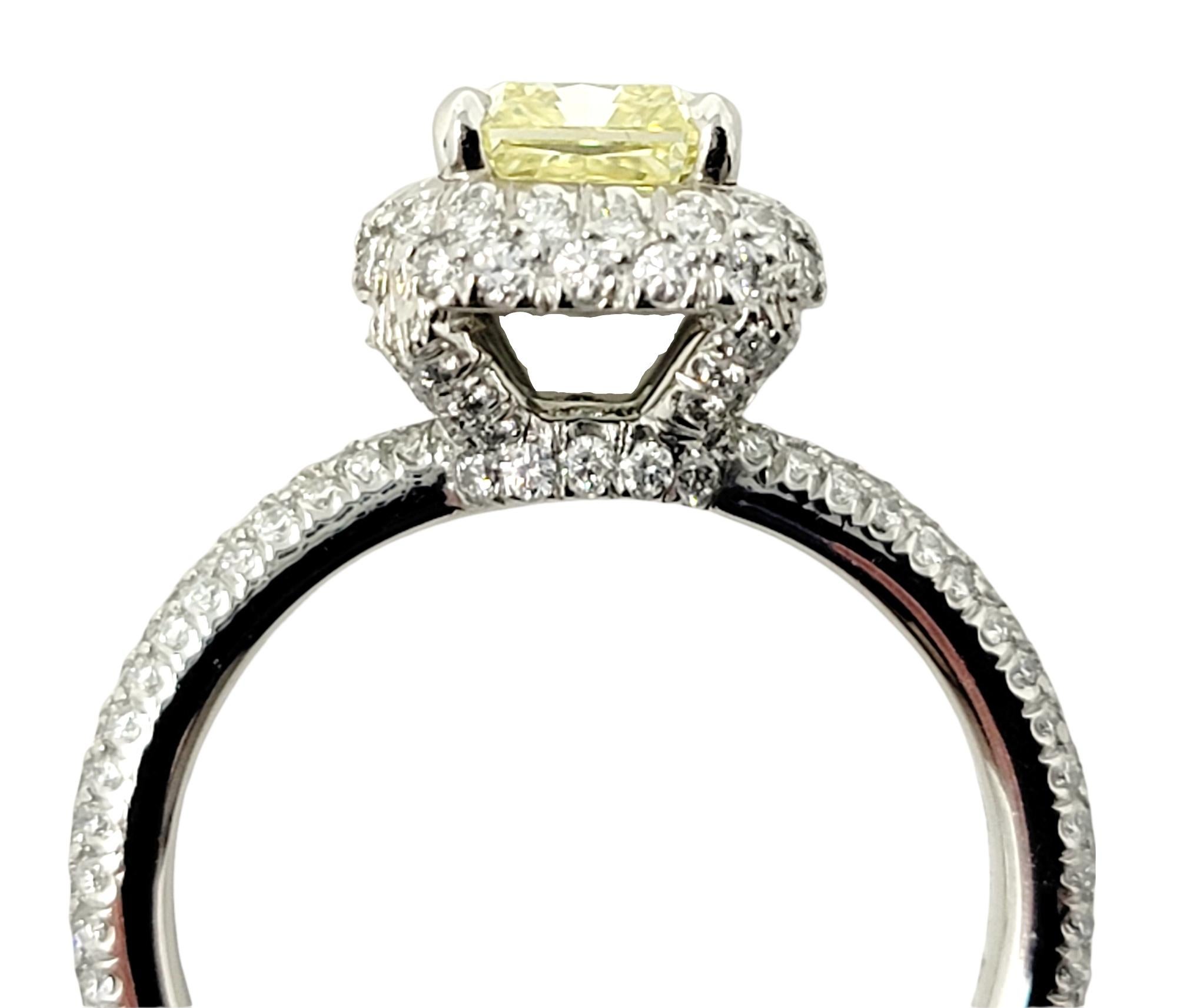 Women's Radiant Cut Natural Fancy Yellow Diamond and Halo Platinum Engagement Ring GIA For Sale