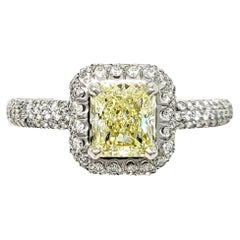 Radiant Cut Natural Fancy Yellow Diamond and Halo Platinum Engagement Ring GIA