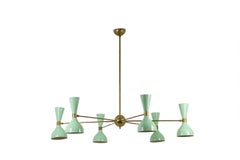 Radiant diabolo-shaped chandelier with 12 lights. Contemporary.