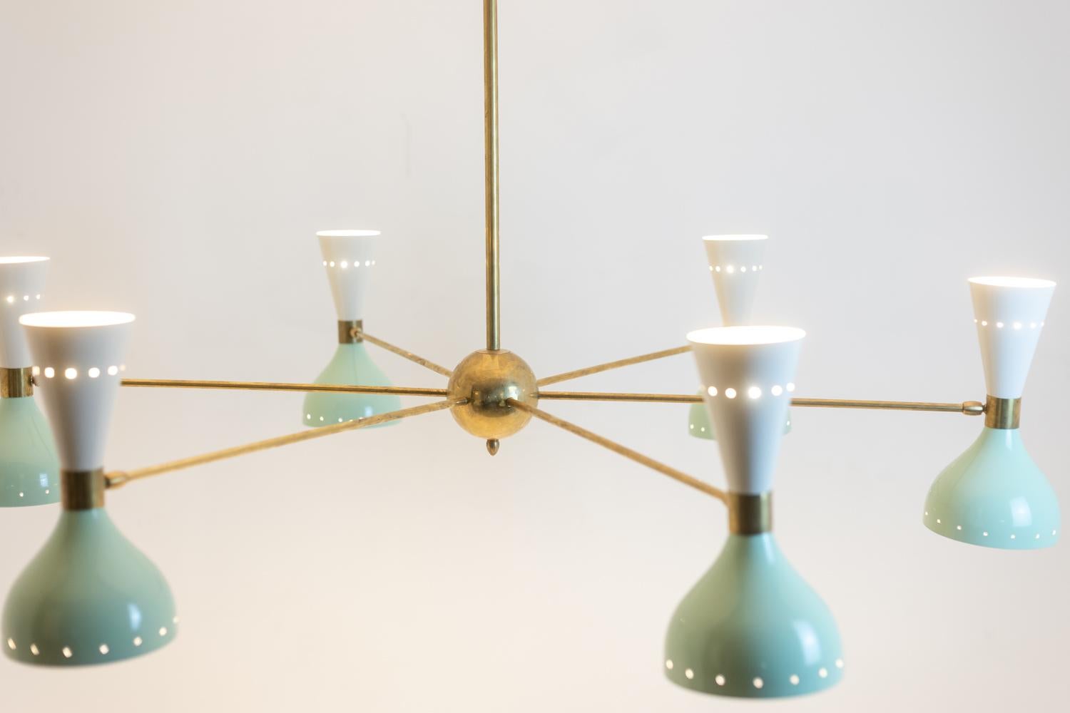 Italian Radiant diabolo-shaped chandelier with 12 lights. Contemporary. For Sale