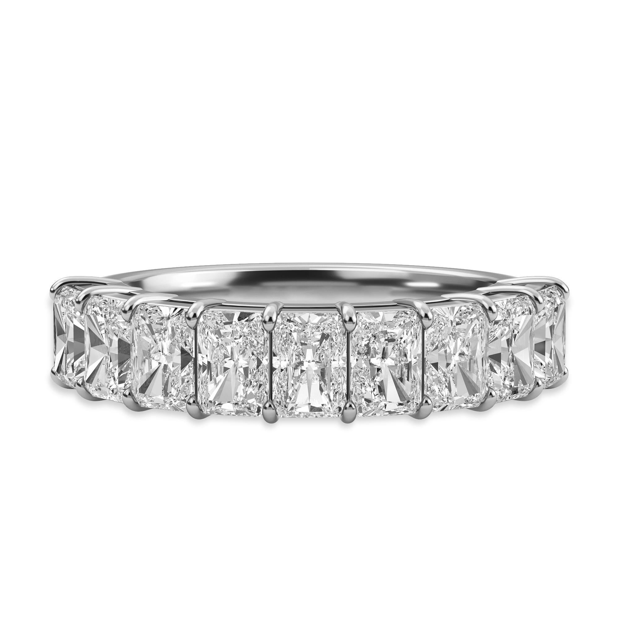 This Radiant Diamond Anniversary Band features 9 Radiant Diamonds, weighing 1.48 Total Carat Weight. 
The stones are G Color, and VS Clarity. This ring is set in Platinum, in a shared prong setting. 