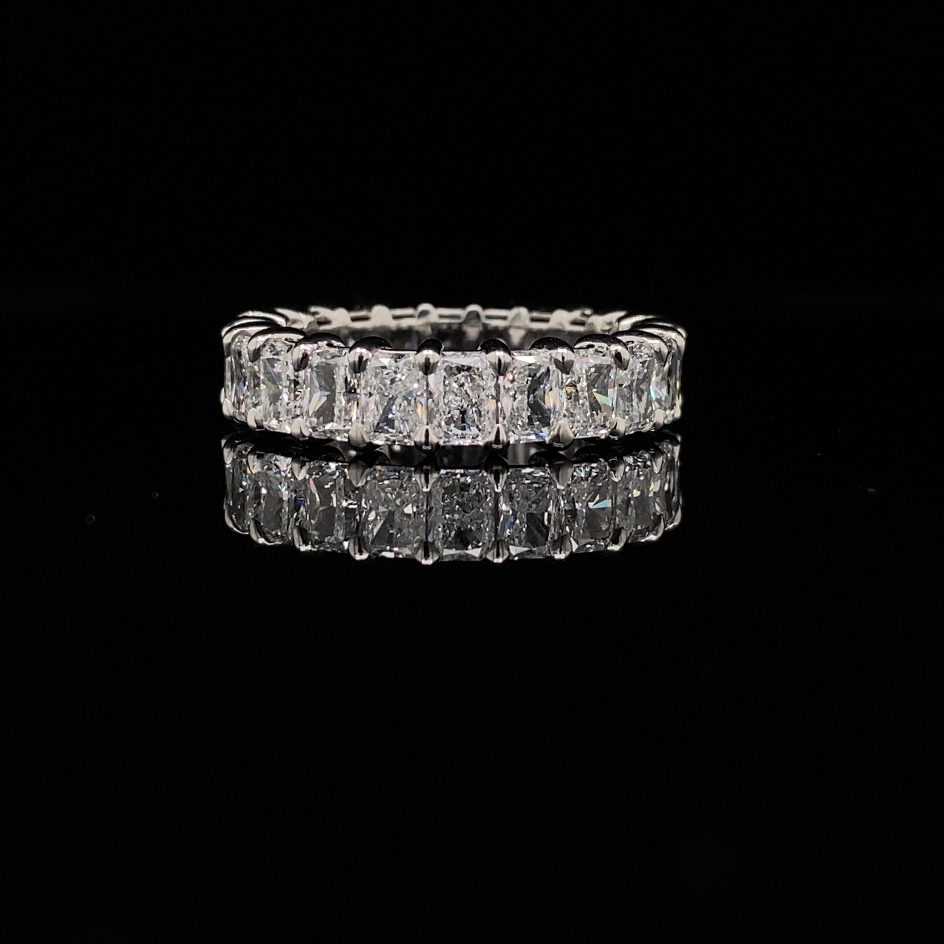This Radiant Diamond Ring has 22 Radiant Diamonds. The Diamonds have a total carat of 4.94.
The diamonds are F color VS clarity. The ring is a finger size 6.25 and is set in Platinum.