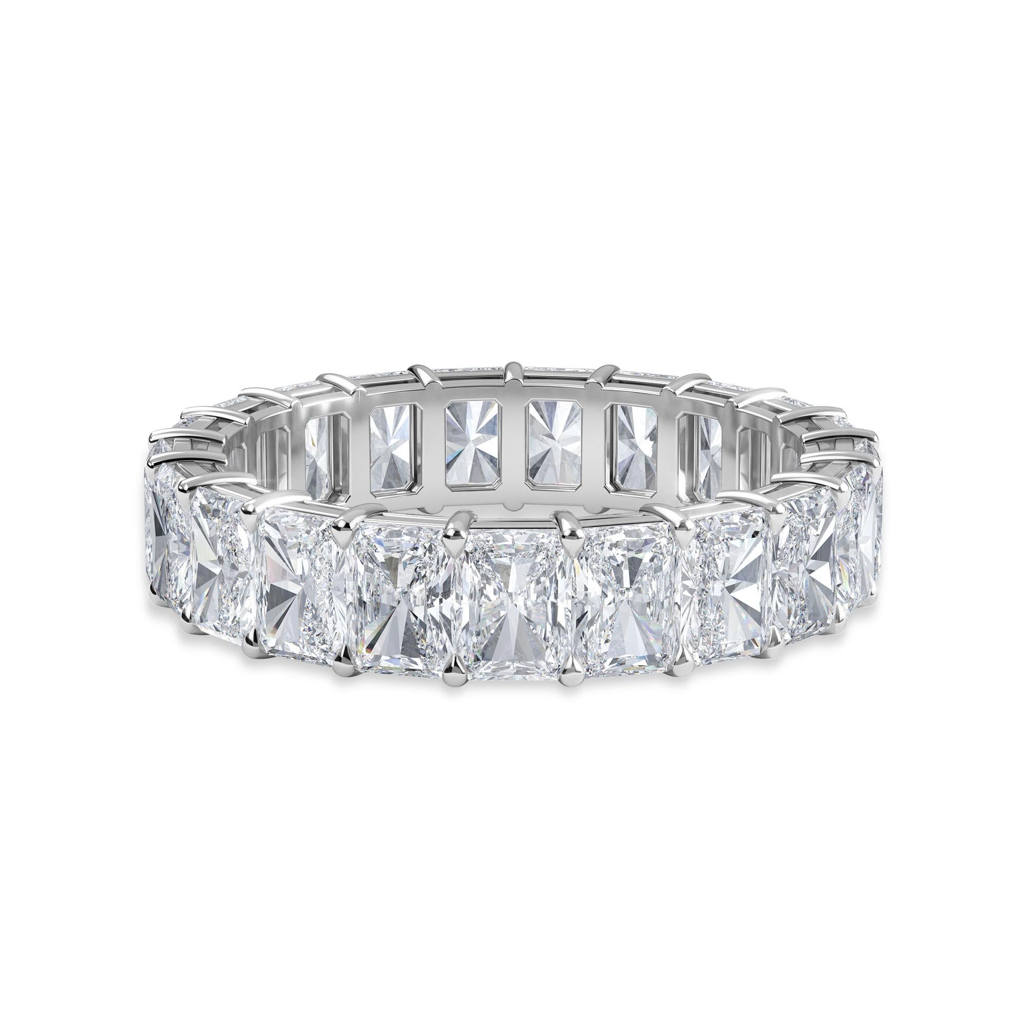 This Radiant Diamond Eternity Band features 21 Radiant Diamonds and has a Total Carat Weight of 5.58. The Diamonds are H Color, VS Clarity, and are set in a Platinum Shared Prong setting in a finger size 6.25. 