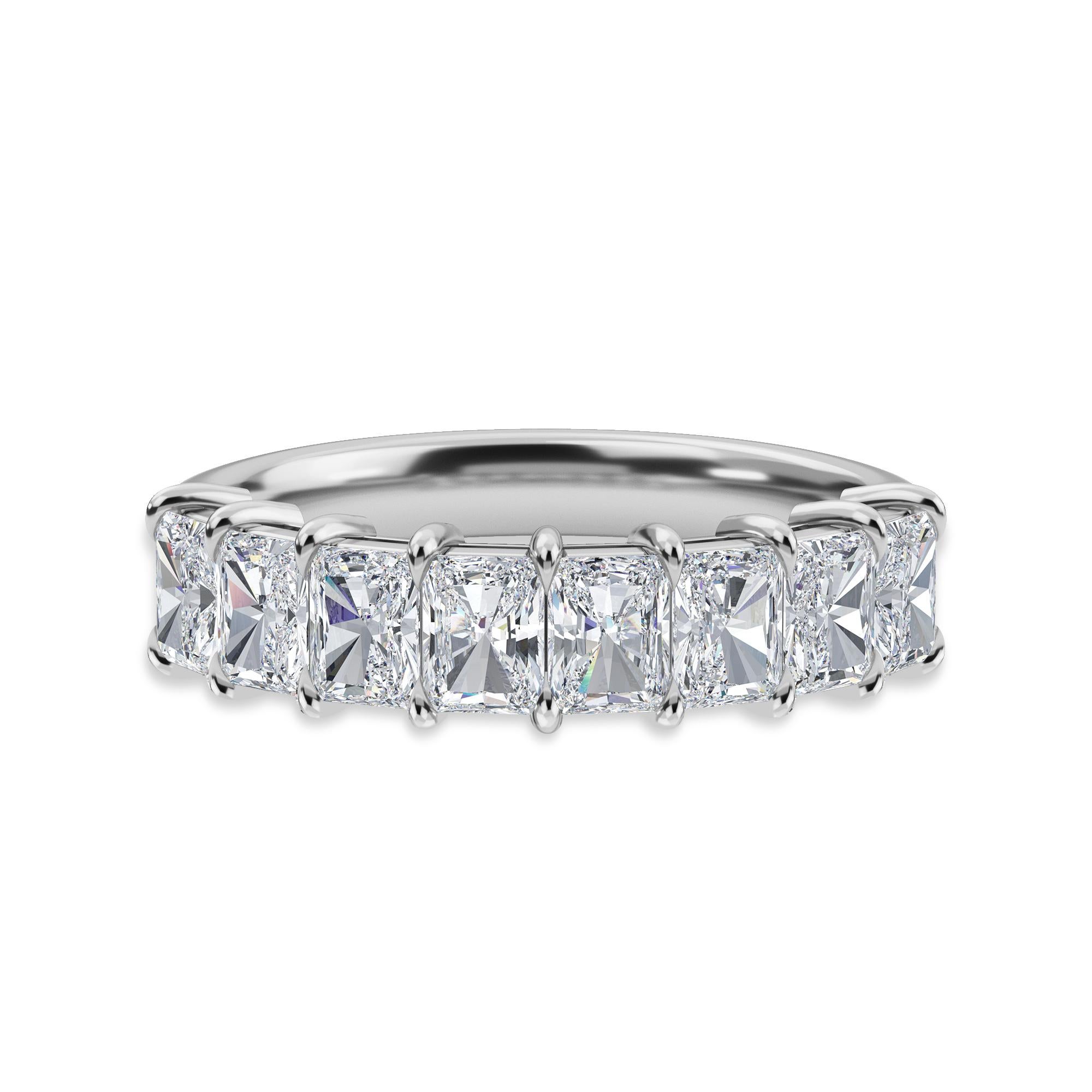 This Ring features 9 Radiant Diamonds with a Total Carat Weight of 1.69.
The diamonds are G-H Color, VS Clarity. The ring is a finger size 6.5 and is set in Platinum.
