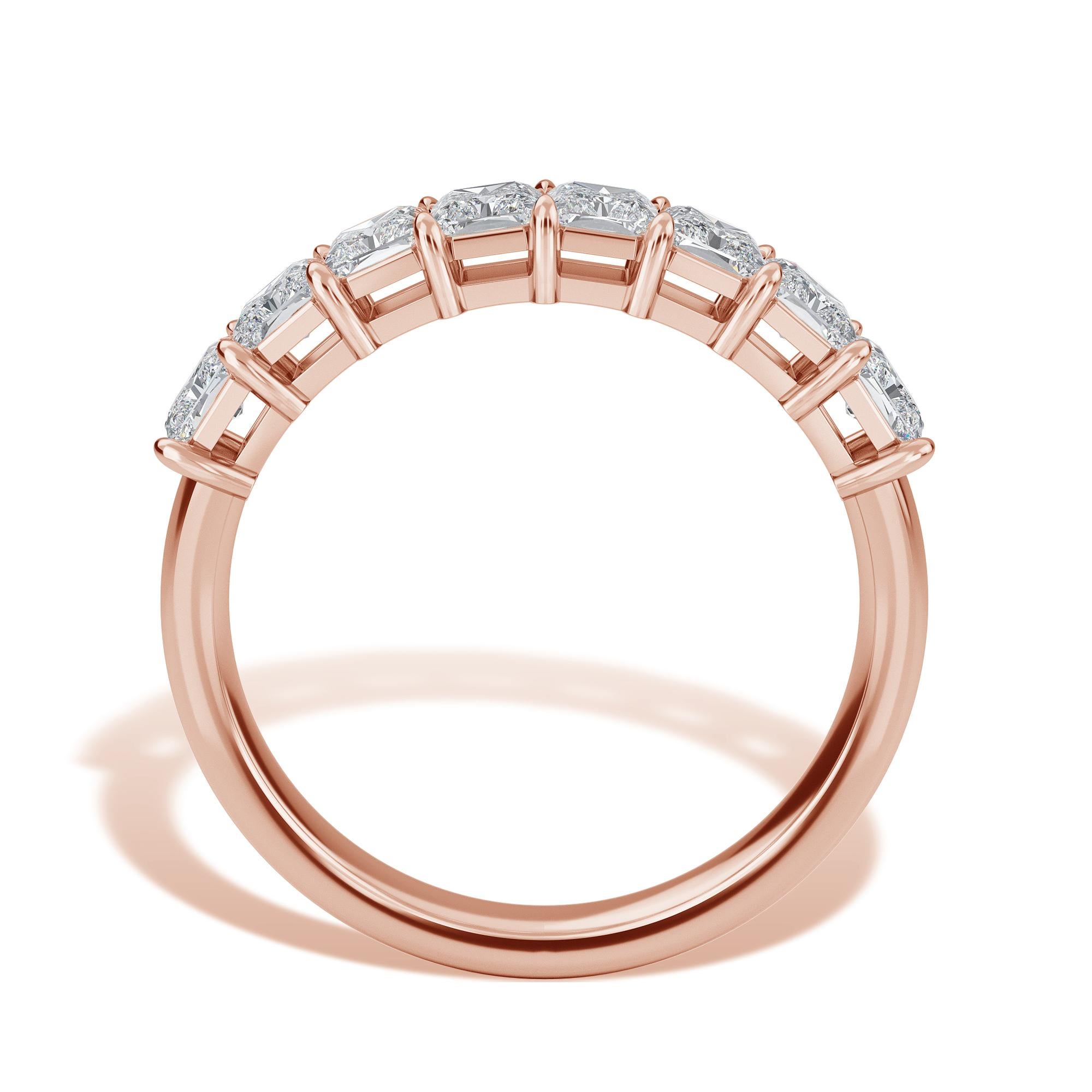 This Rose Gold features 8 Radiant Diamonds, with a total carat weight of 1.56. The diamonds are F Color, VS Clarity, set in 18K Rose Gold in a finger size 6.5.

Message us for additional finger size information. 