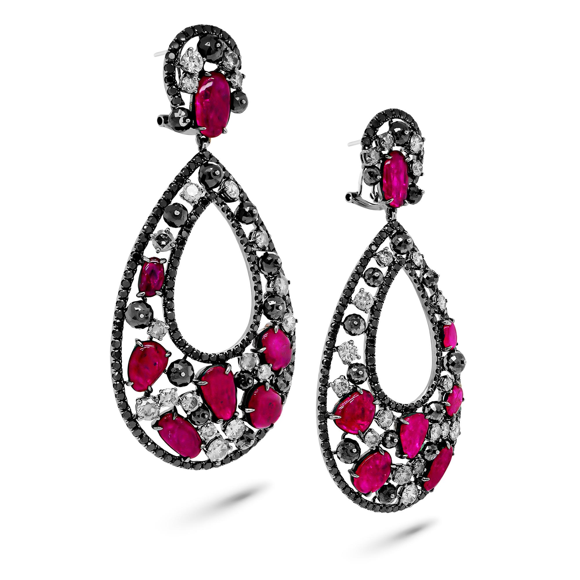 Indulge in opulence with these exquisite earrings, featuring a stunning 12.25 carat vivid red ruby and 10.31 carats of natural grey diamond beads, all set in luxurious 18K gold. These earrings are a harmonious blend of vibrant color and understated
